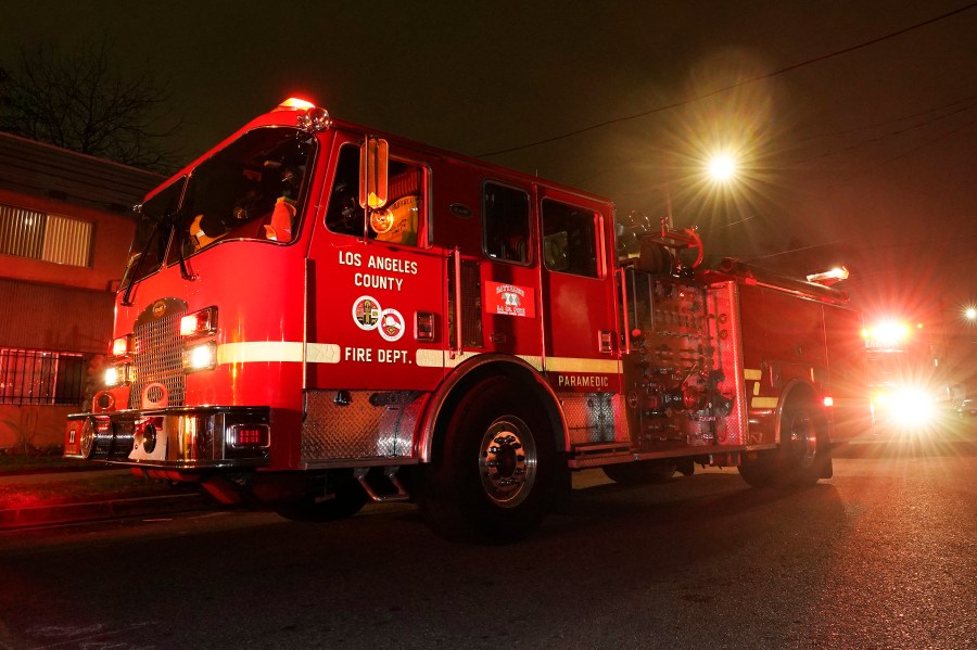 Los Angeles County Fire Department vehicles sit at a medical call Friday, Jan. 7, 2022, in Inglewood, Calif. (AP Photo/Mark J. Terrill)