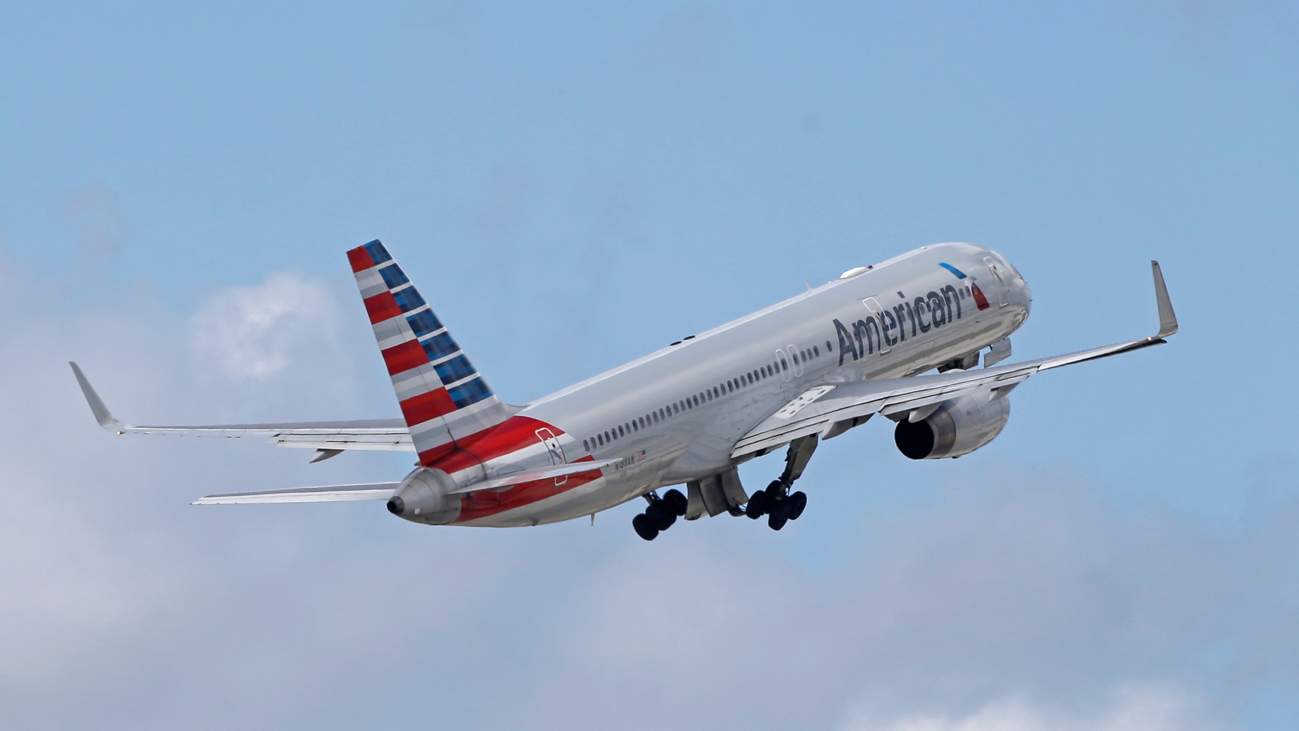 In this June 3, 2016 file photo, an American Airlines passenger jet takes off from Miami International Airport in Miami. (AP Photo/Alan Diaz)