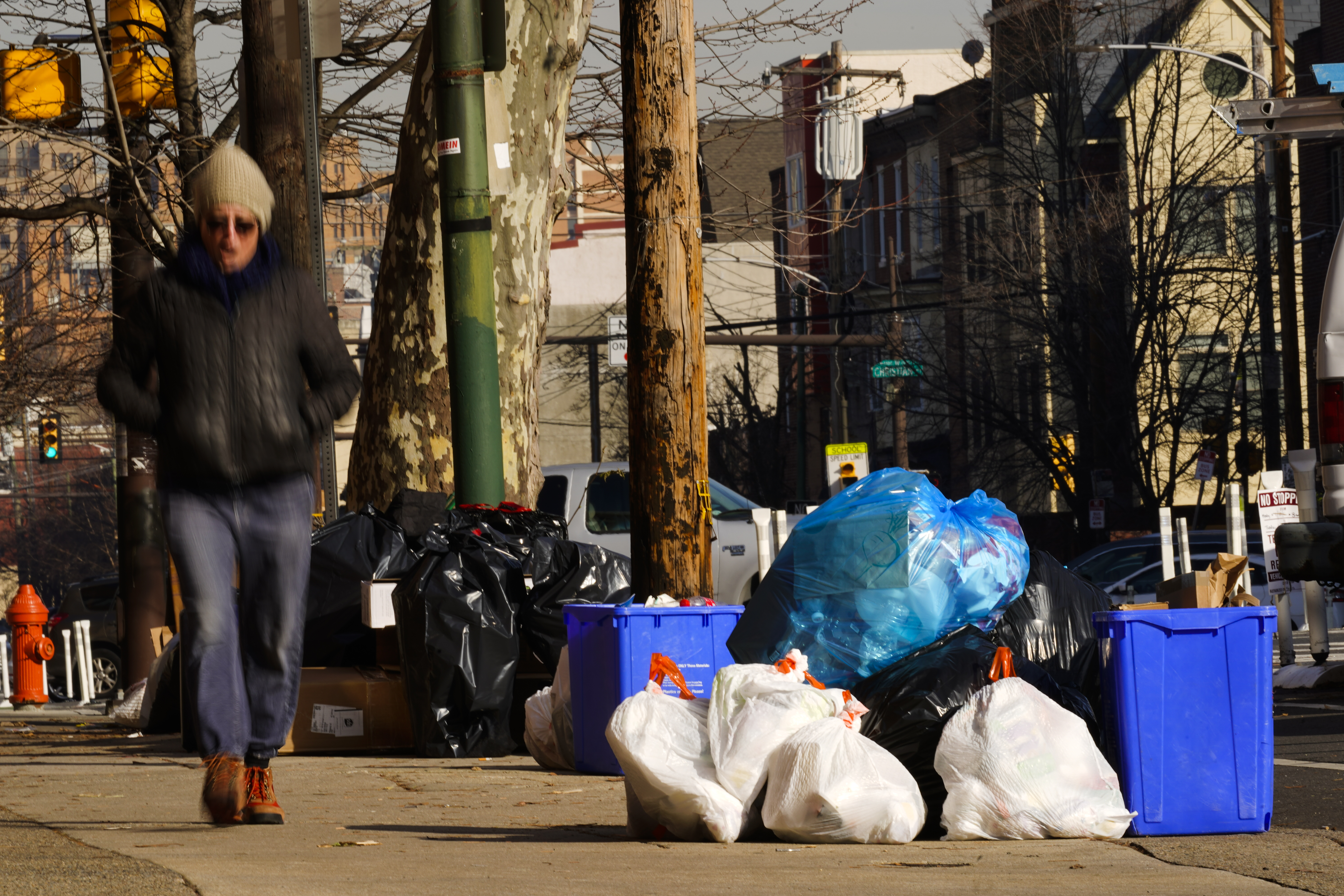 Trash sits out for collection in Philadelphia on Jan. 13, 2022. (Matt Rourke/Associated Press)