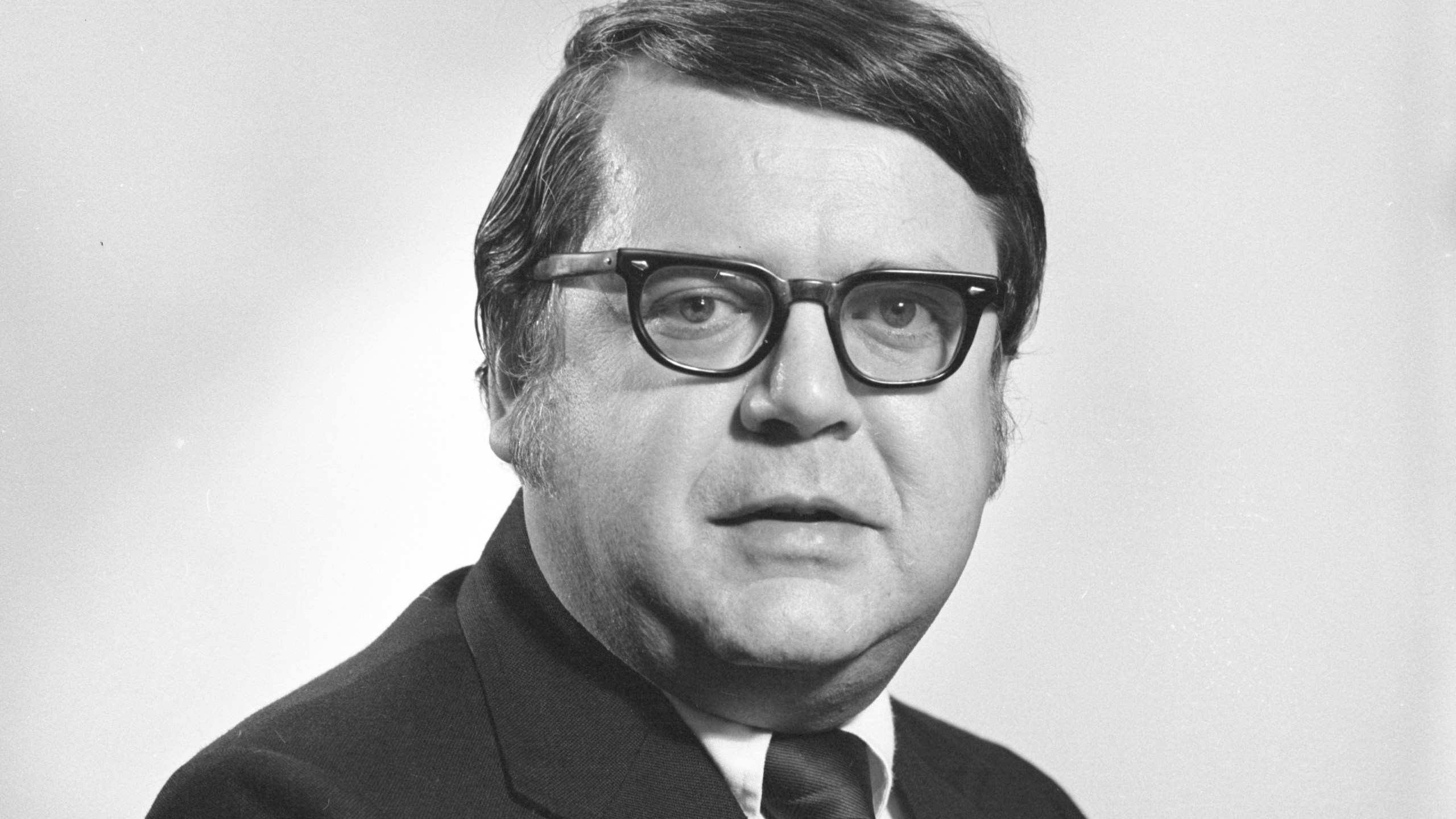 This undated file photo provided by the Bentley Historical Library at the University of Michigan shows Dr. Robert E. Anderson. The University of Michigan has agreed to a $490 million settlement with hundreds of people who say they were sexually assaulted by the former sports doctor at the school. Attorney Parker Stinar says Wednesday, Jan. 19, 2022, that 1,050 people will share in the settlement, which was reached the night before. (Robert Kalmbach/Bentley Historical Library University of Michigan via AP)