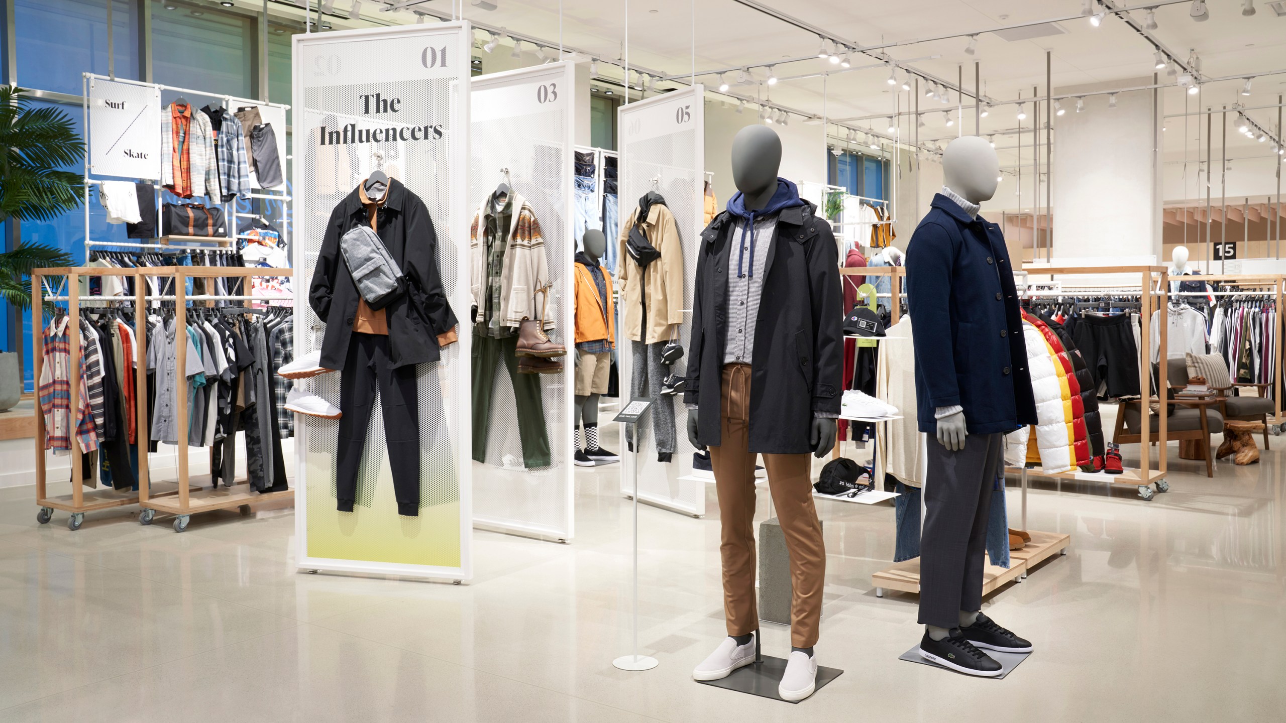 This image provided by Amazon, shows how clothing could be displayed at the company's new Amazon Style store concept. Amazon is set to open its first-ever physical clothing store later this year at the Americana at Brand mall in Glendale, Calif., that will push out personalized recommendations as customers shop and scan items on their phone and feature high-tech dressing rooms, the company announced Thursday, Jan. 20, 2021. (Greg Montijo/Amazon via AP)