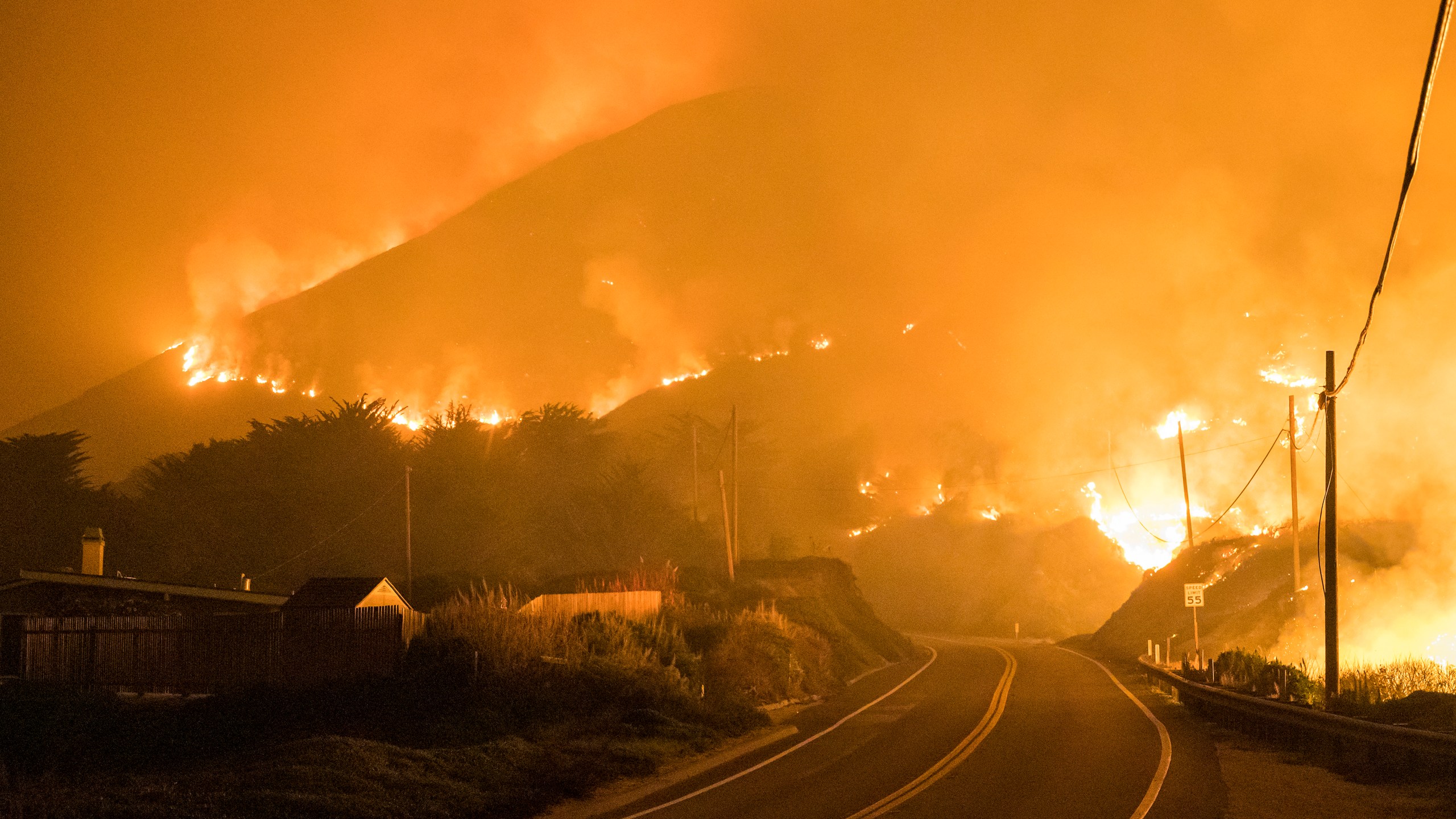 The Colorado Fire burns along Highway 1 near Big Sur, Calif., Saturday, Jan. 22, 2022. (AP Photo/Nic Coury)