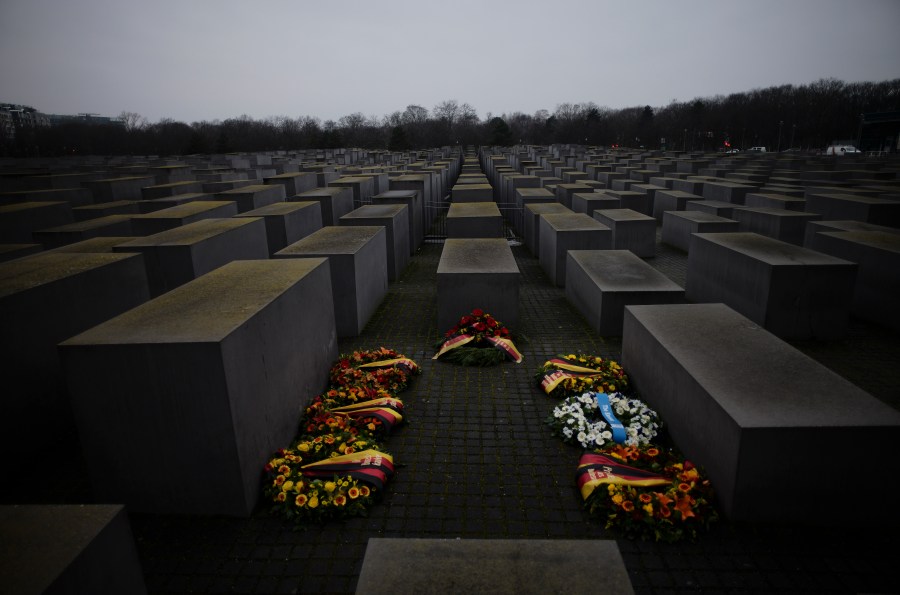 Wreaths placed at the Memorial to the Murdered Jews of Europe on the International Holocaust Remembrance Day in Berlin, Germany, Thursday, Jan. 27, 2022. The International Holocaust Remembrance Day marking the anniversary of the liberation of the Nazi dear camp Auschwitz on Jan. 27, 1945. (AP Photo/Markus Schreiber)