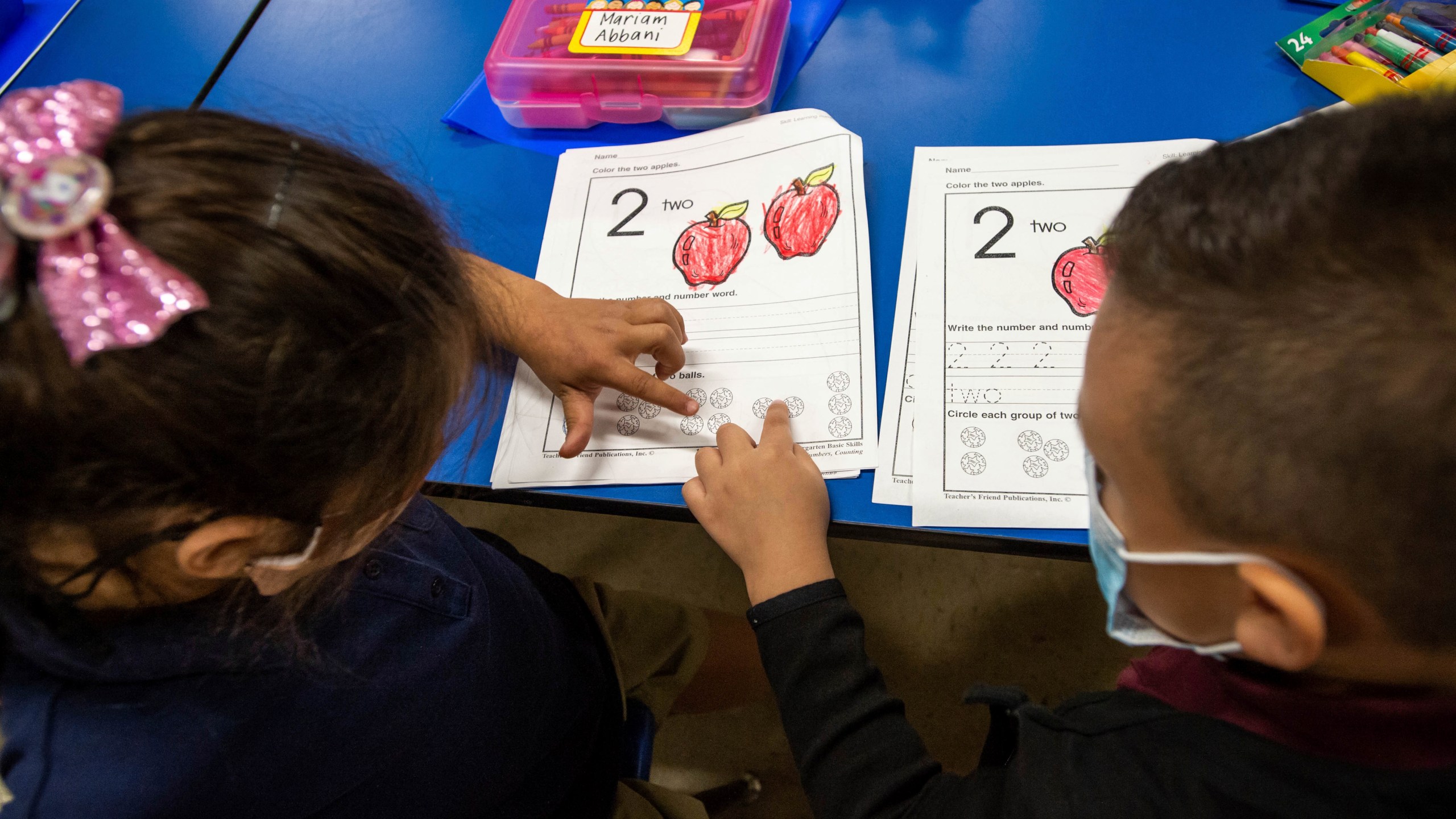 Kindergartners work together on their class assignment at Repetto Elementary School in Monterey Park, Calif., on Tuesday, Aug. 17, 2021. California’s Department of Education says that only 25% of students took statewide assessment tests in 2020-21 as schools scrambled to administer the exams in the midst of the pandemic. (Sarah Reingewirtz/The Orange County Register via AP, File)