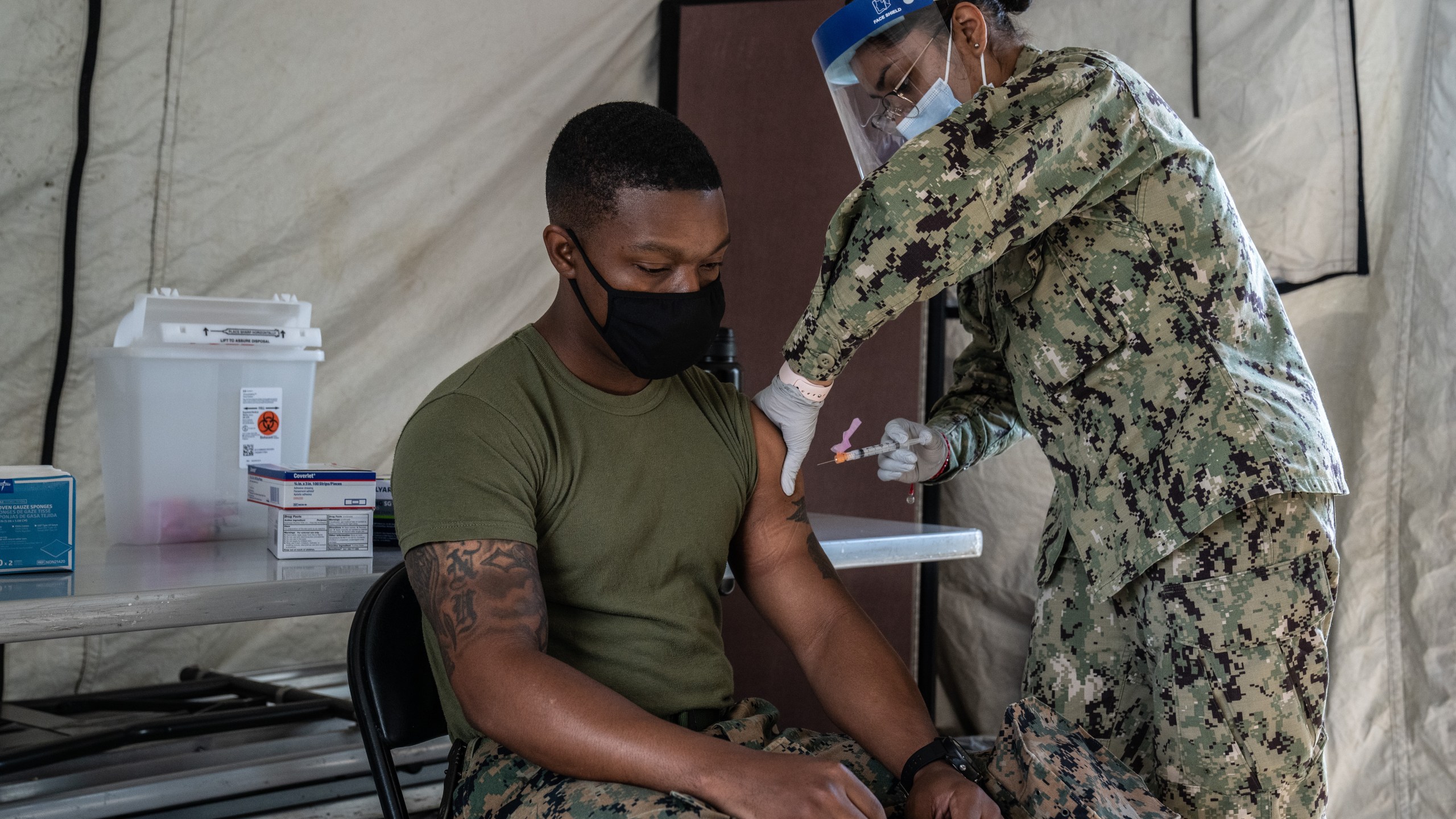 A United States Marine receives the Moderna coronavirus vaccine at Camp Foster on April 28, 2021 in Ginowan, Japan. (Carl Court/Getty Images)