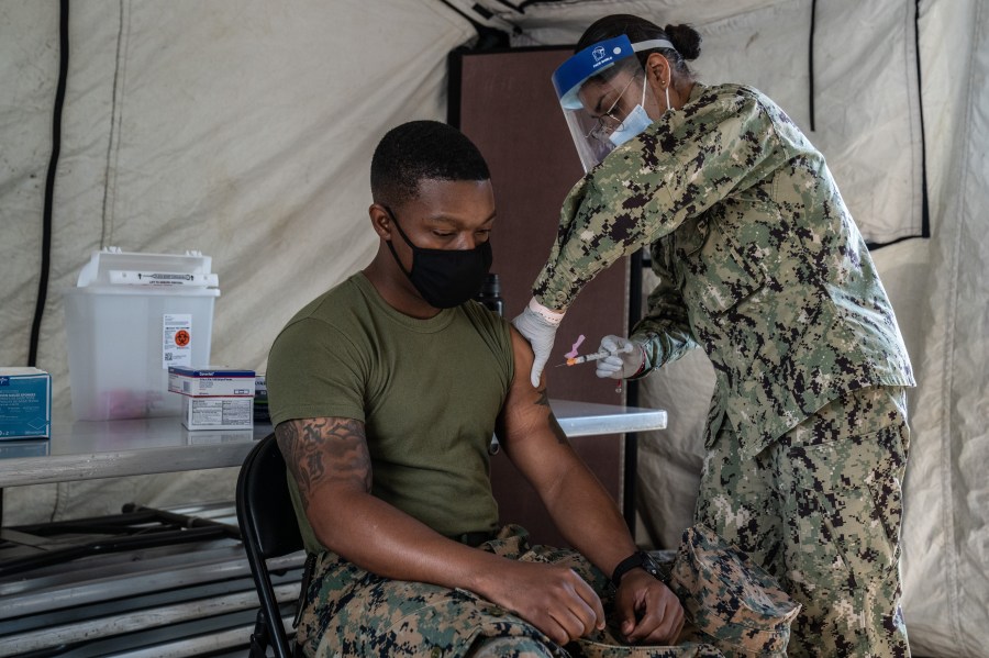 A United States Marine receives the Moderna coronavirus vaccine at Camp Foster on April 28, 2021 in Ginowan, Japan. (Carl Court/Getty Images)