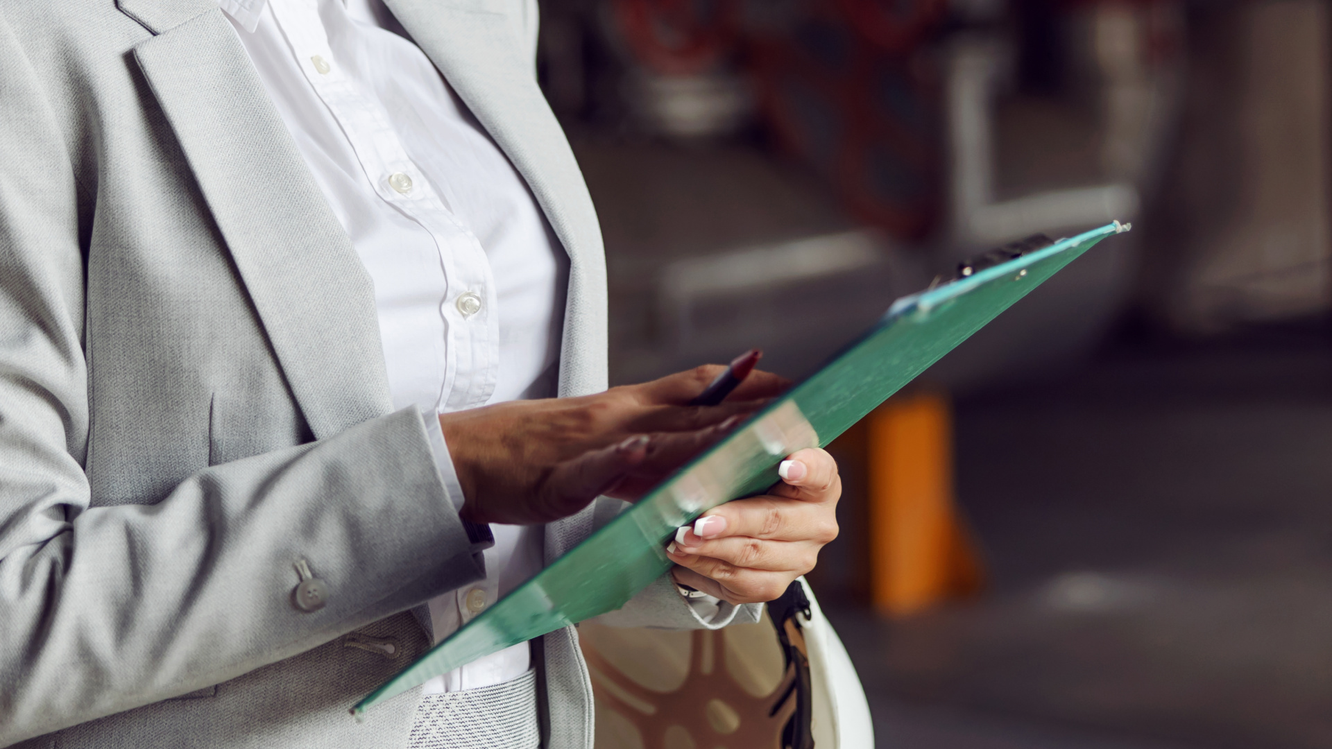 A woman looks at a clipboard in this undated file photo. (Getty Images)