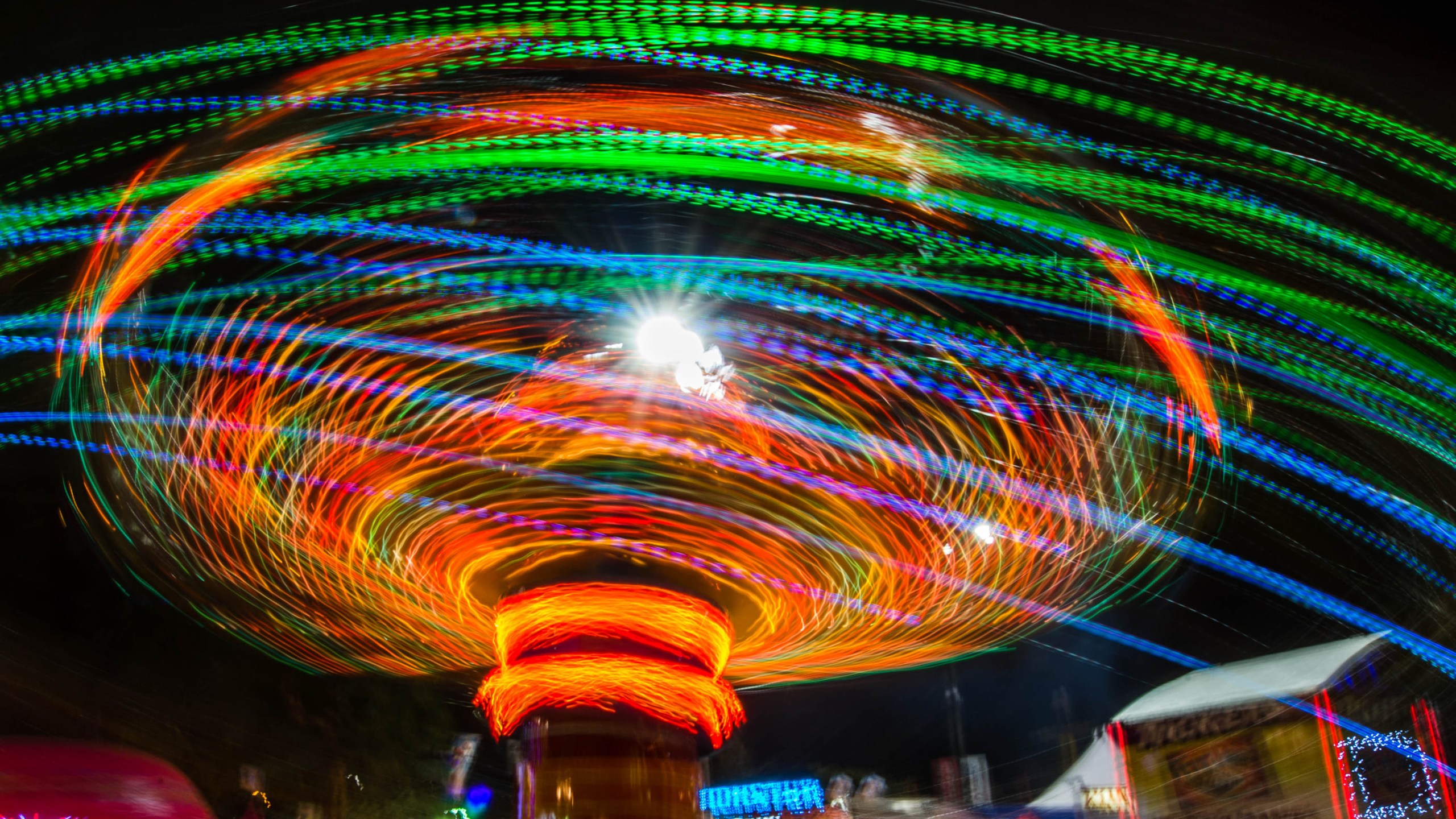 Spinning carousel during the Los Angeles County Fair 2013 in Pomona on on Sept. 4, 2013. (JOE KLAMAR/AFP via Getty Images)