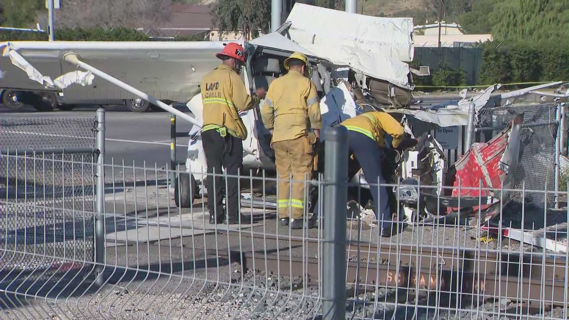 Investigators are studying the remains of a plane that crashed and was hit by a train in Pacoima on Jan. 9, 2022. (KTLA)