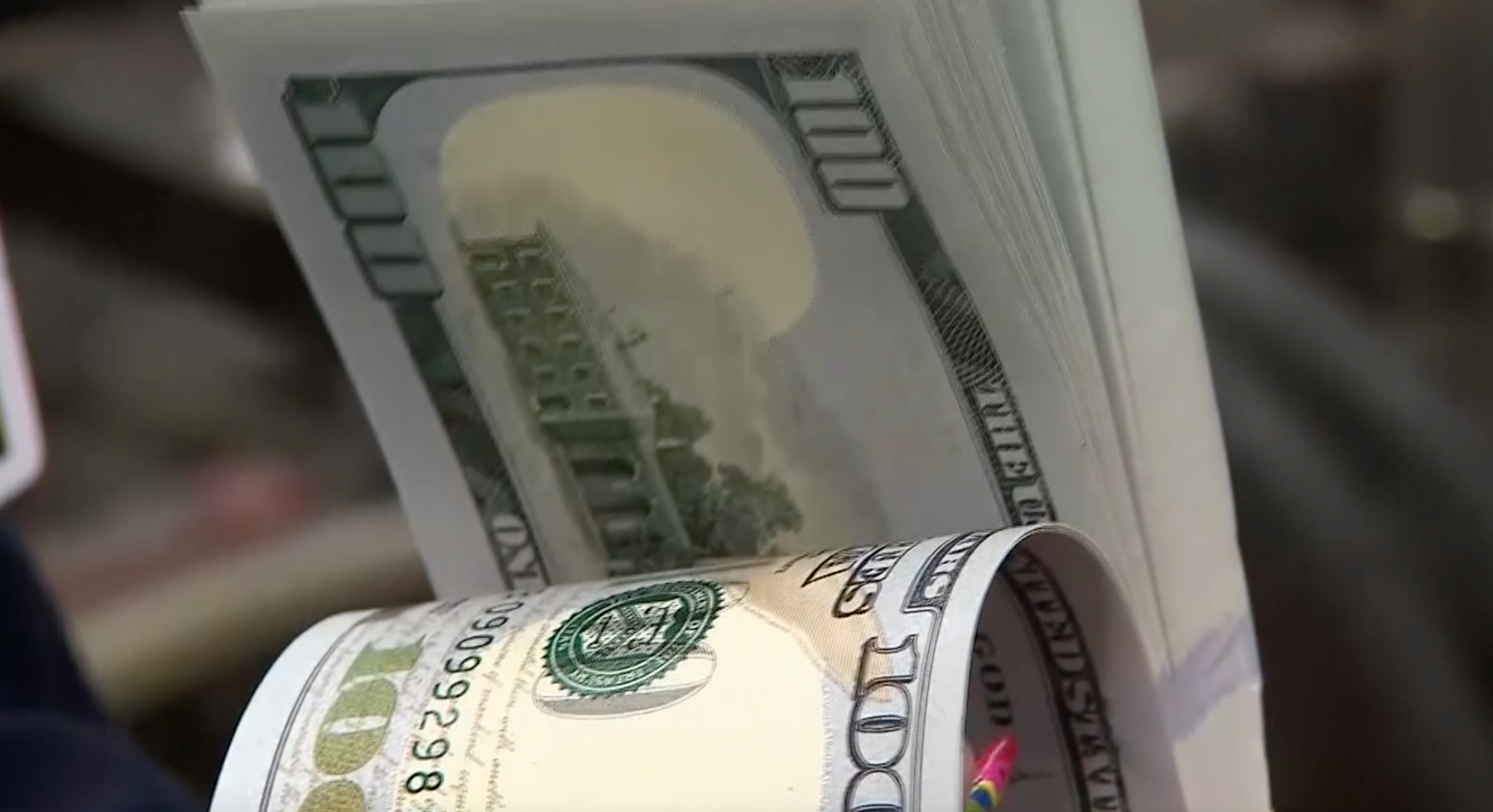 $100 bills are seen in a file photo. (NEXSTAR)