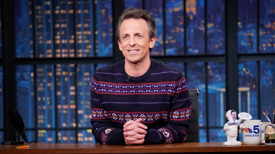 This image released by NBC shows Seth Meyers on "Late Night with Seth Meyers" in New York on Dec. 16, 2021. This week’s remaining episodes have been scrapped after the Meyers tested positive for COVID-19. Meyers tweeted Tuesday his positive result but said he felt fine, thanking the vaccine and a booster. NBC has canceled shows scheduled from Tuesday to Friday. (Lloyd Bishop/NBC via AP)