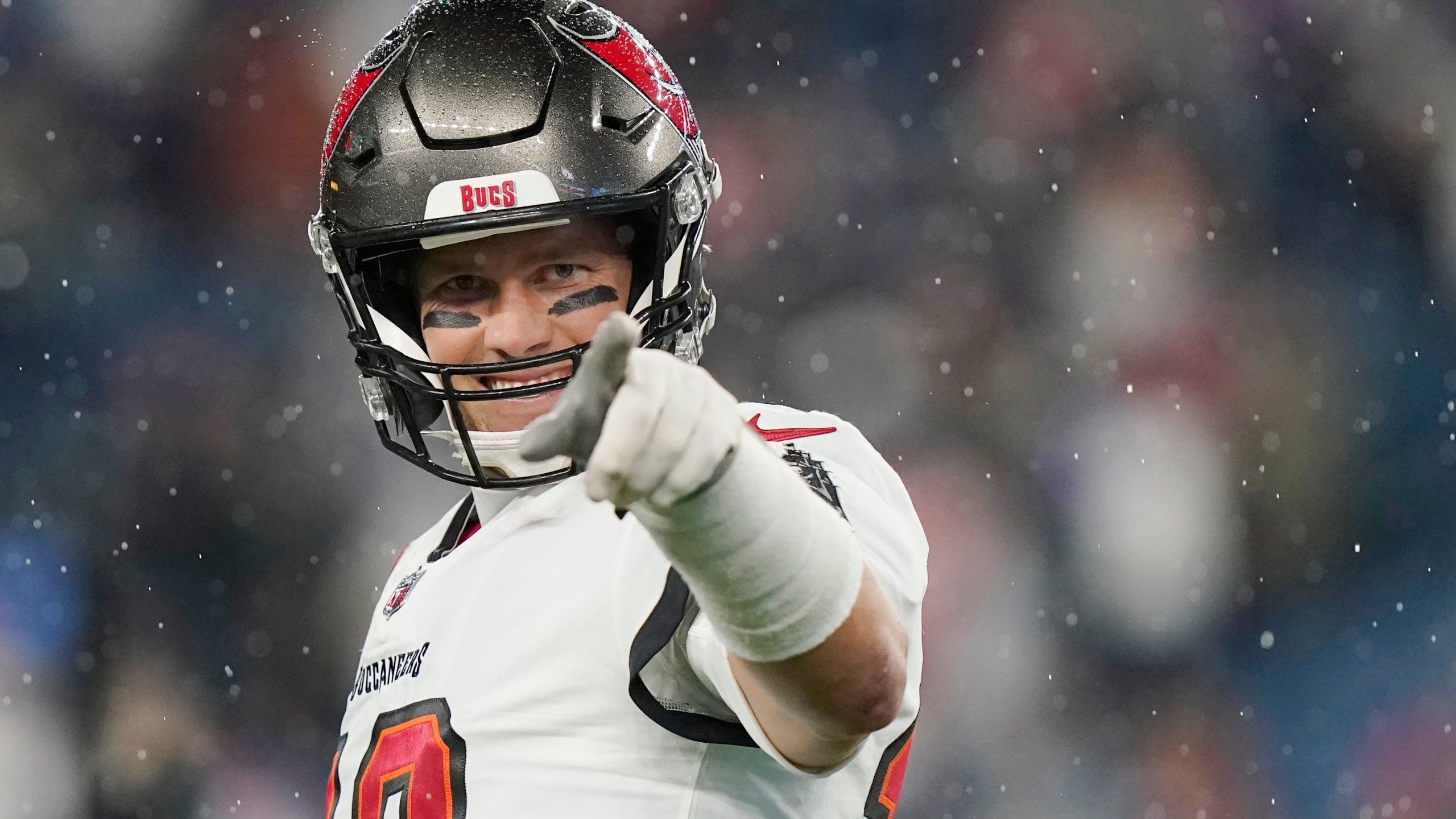 Tampa Bay Buccaneers quarterback Tom Brady (12) points toward the sidelines prior to an NFL football game between the New England Patriots and Tampa Bay Buccaneers on Oct. 3, 2021, in Foxborough, Mass. (Steven Senne/Associated Press)