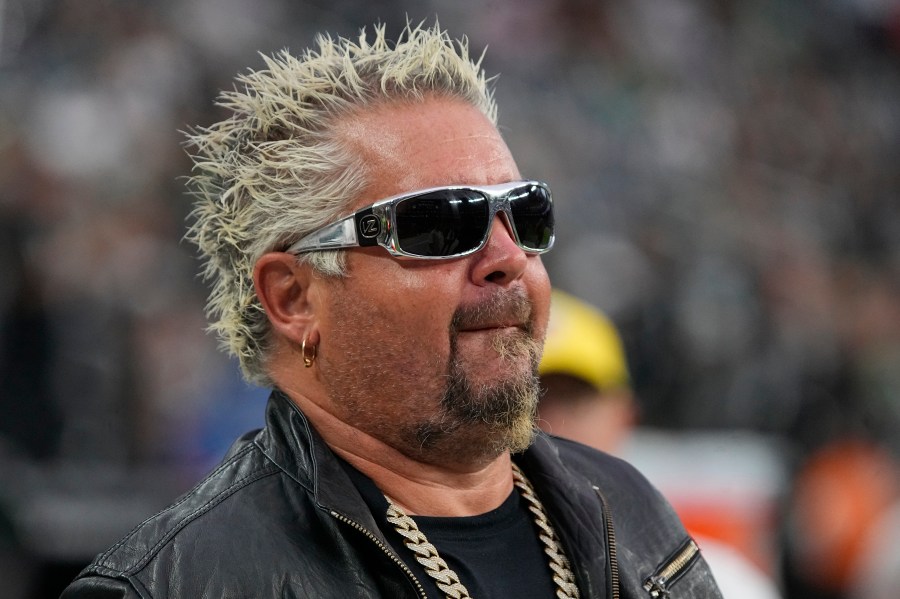 Guy Fieri during the second half of an NFL football game between the Las Vegas Raiders and the Philadelphia Eagles, Sunday, Oct. 24, 2021, in Las Vegas. (AP Photo/Rick Scuteri)