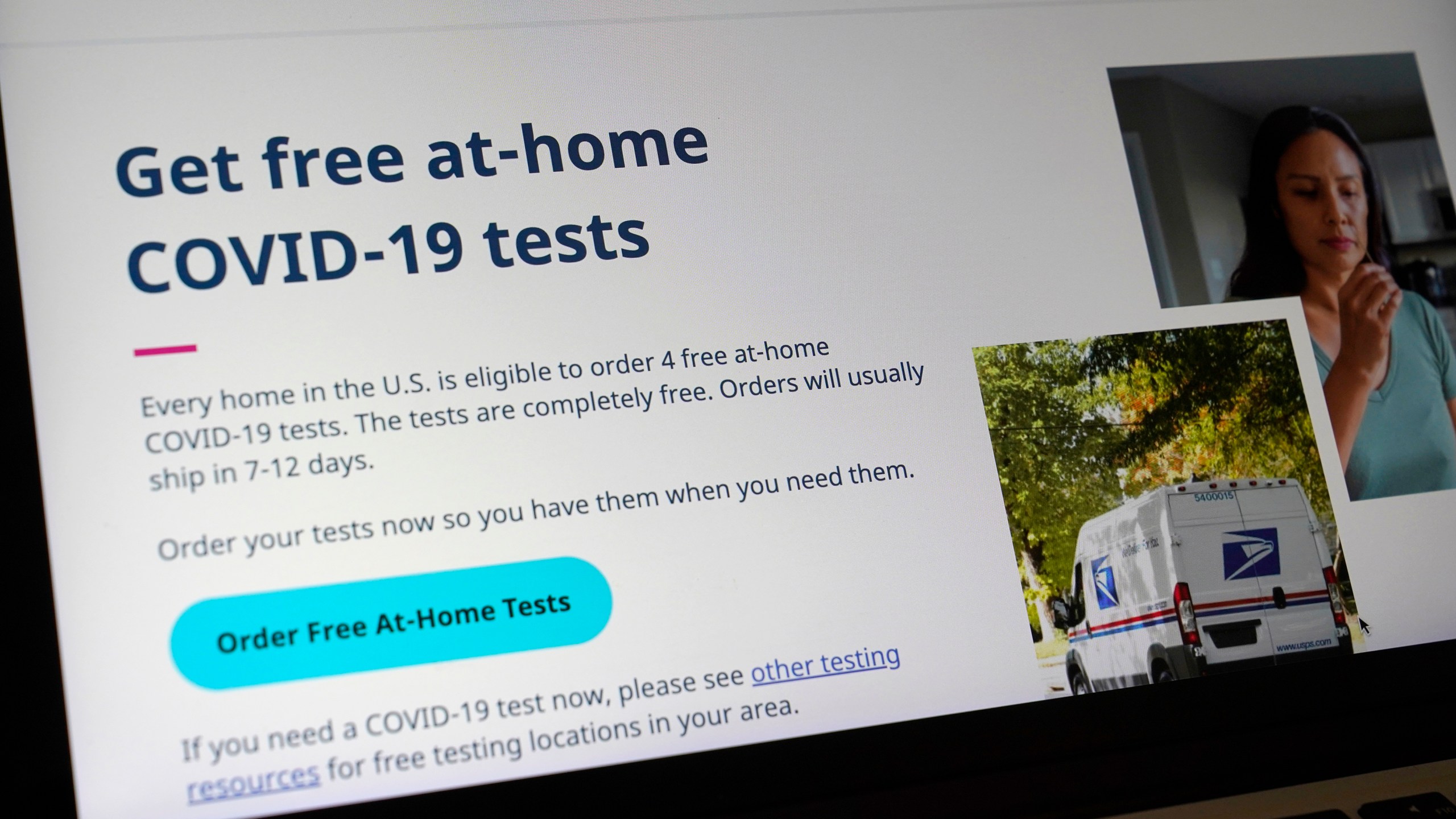 A United States government website is displayed on a computer, Wednesday, Jan. 19, 2022, in Walpole, Mass., that features a page where people can order free, at-home COVID-19 tests. The website, COVIDTests.gov, allows people to order four at-home tests per residence and have them delivered by mail. (AP Photo/Steven Senne)