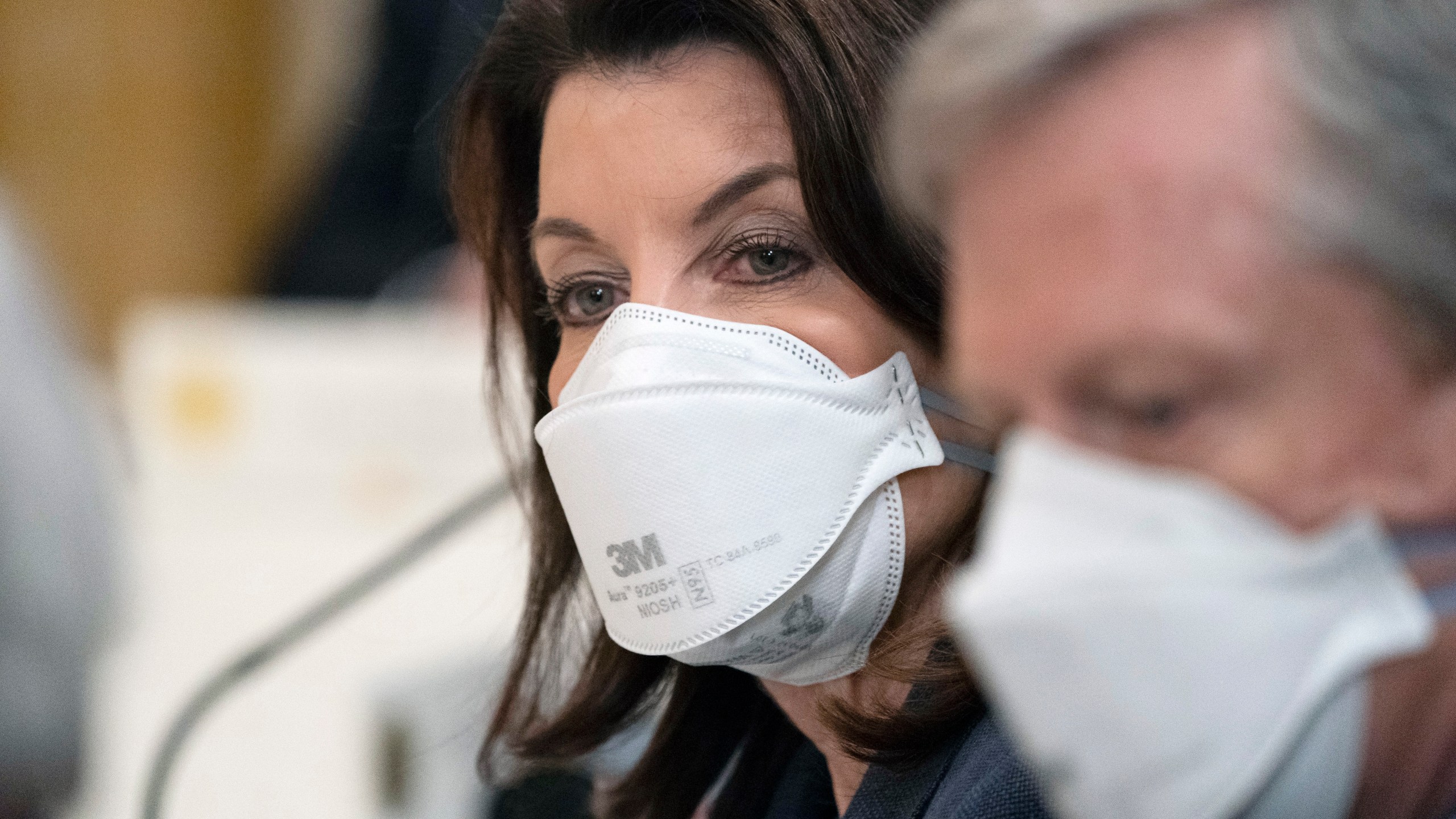 Gov. Kathy Hochul, D-N.Y., listens as President Joe Biden speaks during a meeting with the National Governors Association in the East Room of the White House, Monday, Jan. 31, 2022, in Washington. (AP Photo/Alex Brandon)