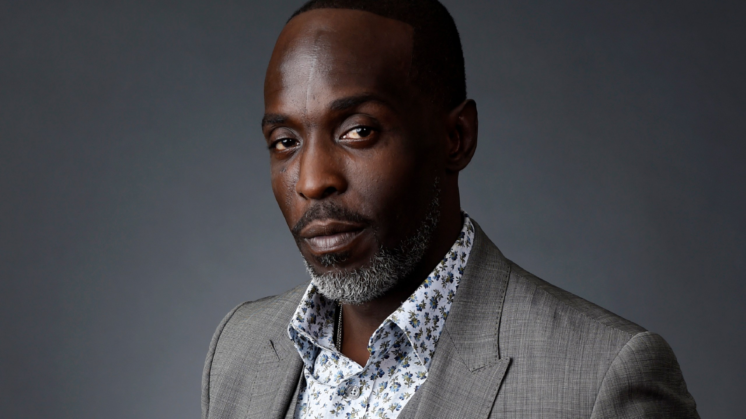 Actor Michael K. Williams poses for a portrait at the Beverly Hilton during the 2016 Television Critics Association Summer Press Tour on July 30, 2016, in Beverly Hills, Calif. A federal prosecutor says four men have been charged in the overdose death of Williams, who gained fame playing Omar Little on "The Wire." New York City’s medical examiner earlier ruled that the 54-year-old Williams died of acute drug intoxication in September. (AP Photo/Chris Pizzello, File)