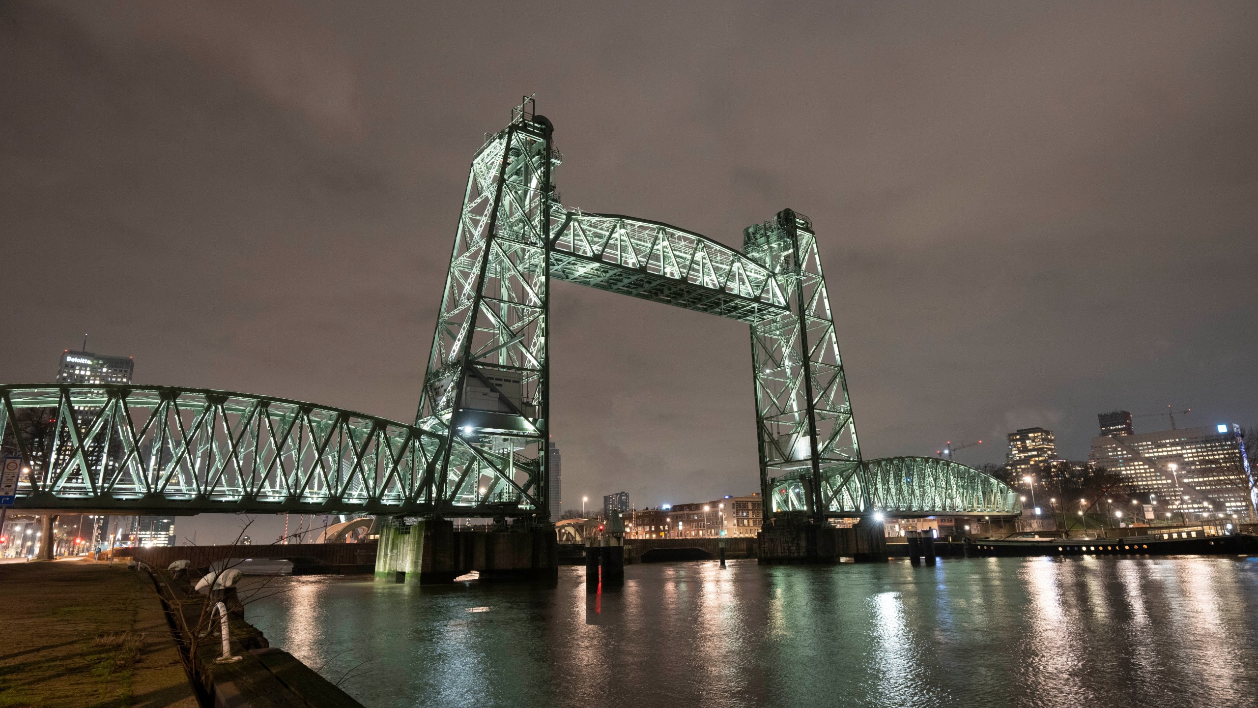 View of the Koningshaven Bridge, known as De Hef, (The Lift), in Rotterdam, Netherlands, Thursday, Feb. 3, 2022. A plan to dismantle the historic bridge in the heart of Dutch port city so that a huge yacht, reportedly being built for Amazon founder Jeff Bezos, can get to the North Sea is unlikely to be plain sailing. Reports this week that the city had already agreed to take apart the recently restored bridge sparked anger in the city, with one Facebook group set up calling for people to pelt the multimillion dollar yacht with rotten eggs. (AP Photo/Peter Dejong)