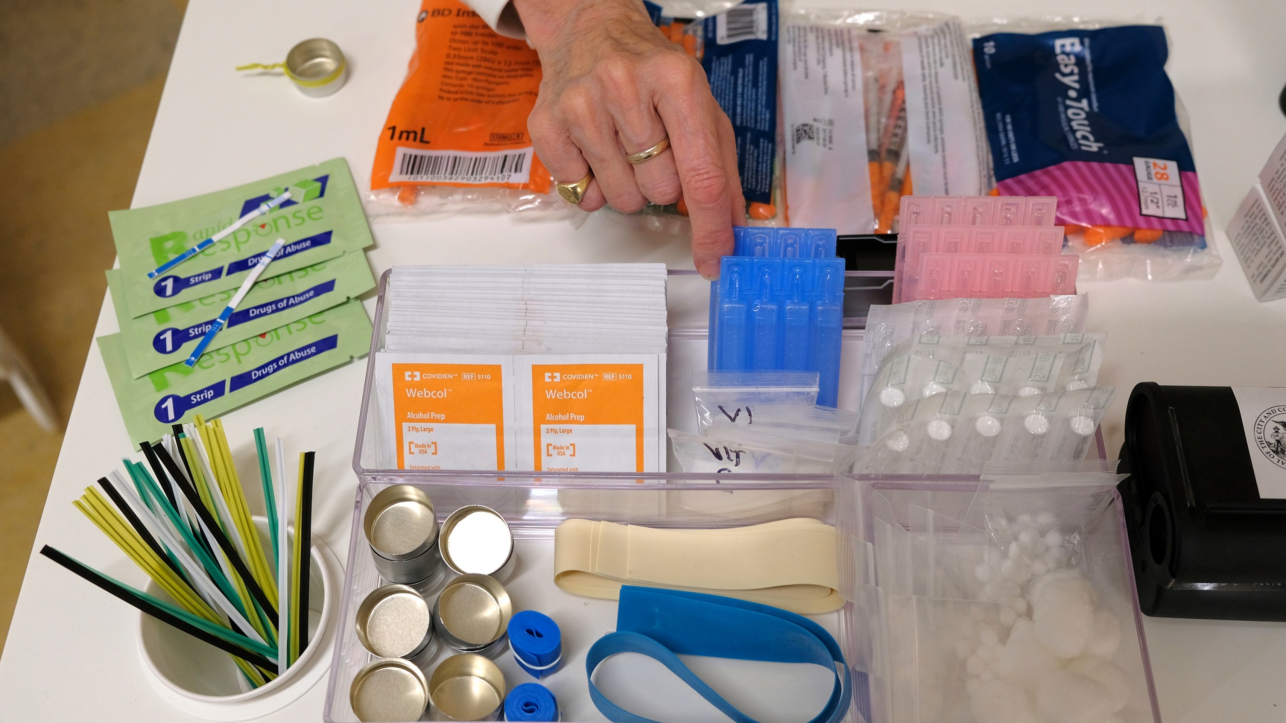 Supplies are shown on a desk at Safer Inside, a realistic model of a safe injection site in San Francisco, on Aug. 29, 2018. (AP Photo/Eric Risberg, File)