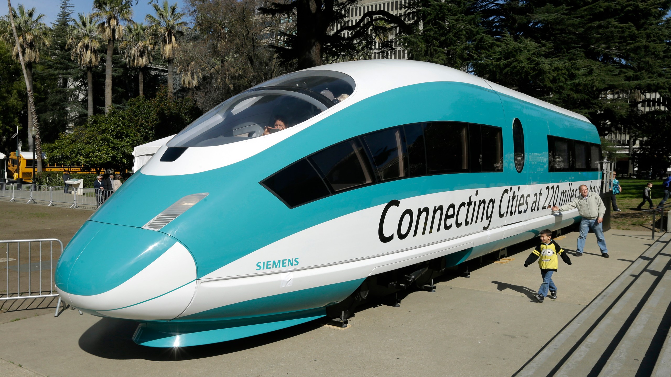 A full-scale mock-up of a high-speed train, is displayed at the Capitol in Sacramento, Calif., on Feb. 26, 2015. The California High-Speed Rail Authority's biennial business plan, released Tuesday, Feb. 8, 2022, shows the estimated cost of the project rising by about $5 billion, compared to the 2020 plan, up to as much as $105 billion. (AP Photo/Rich Pedroncelli, File)