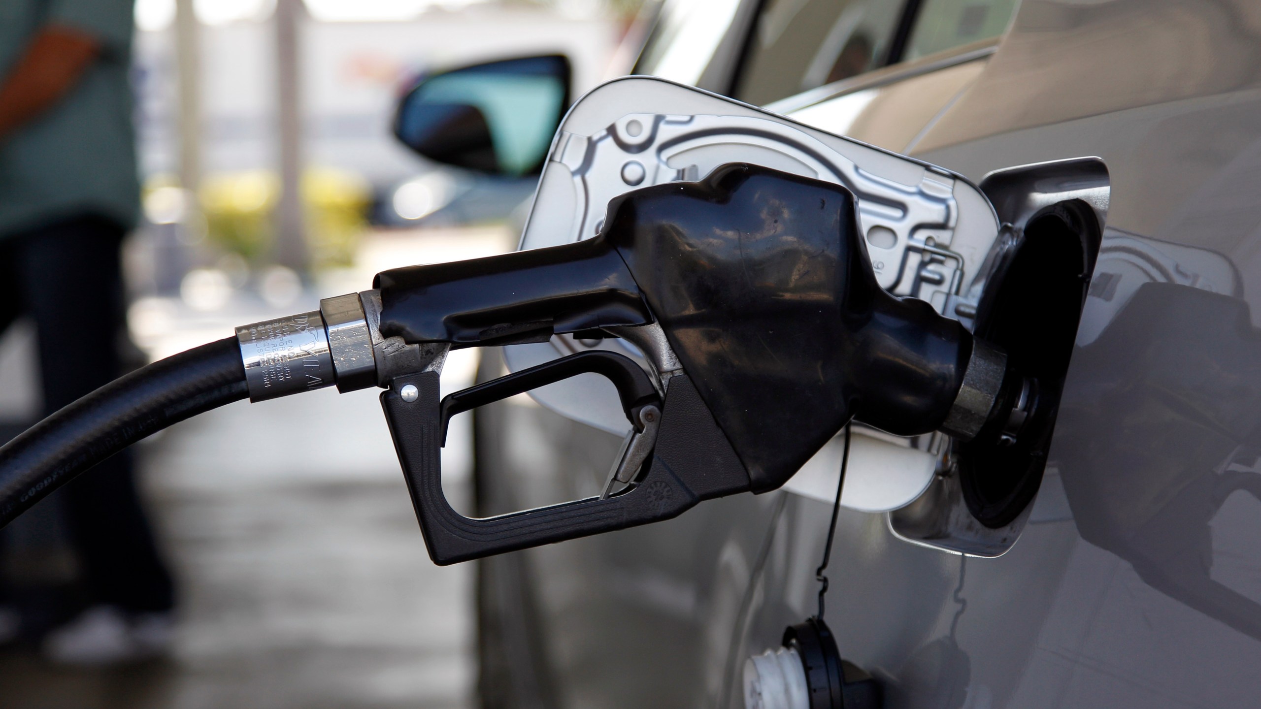 Fuel is pumped into a vehicle, Thursday, June 14, 2012, in Miami. Two Democratic senators are calling for suspending the federal gas tax for the remainder of 2022 to help consumers struggling with rising fuel prices (AP Photo/Lynne Sladky, File)