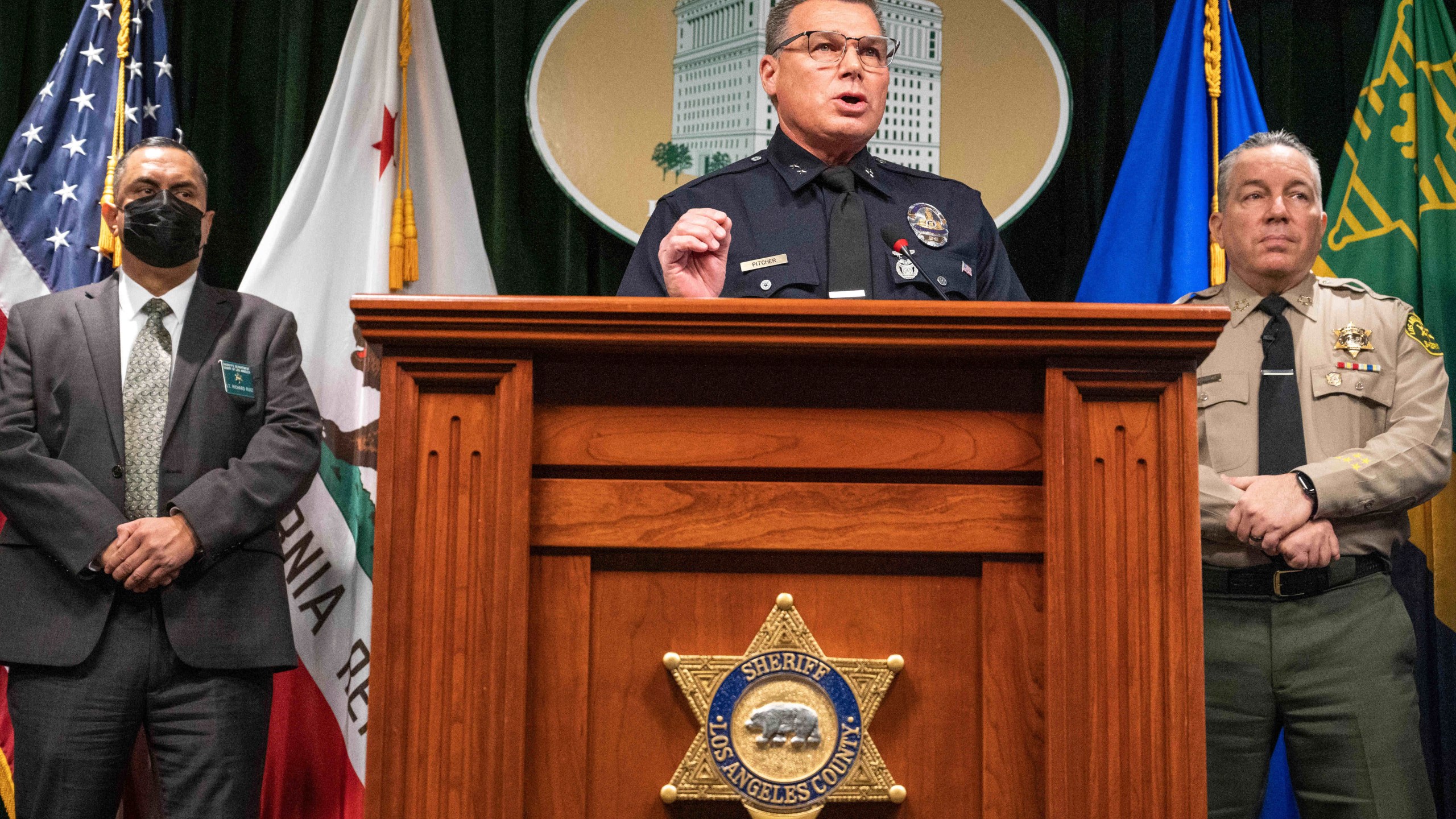 Los Angeles Police Department Deputy Chief Kris Pitcher and l.A. County Sheriff Alex Villanueva hold a news conference on a week-long statewide operation aimed at combating human trafficking on Feb. 15, 2022 in Los Angeles. (Sarah Reingewirtz/The Orange County Register via AP)