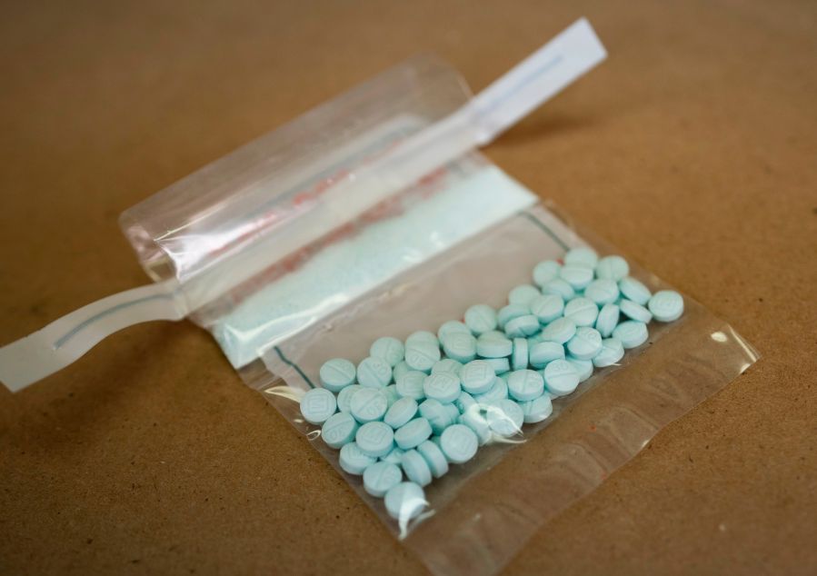 Tablets believed to be laced with fentanyl are displayed at the Drug Enforcement Administration Northeast Regional Laboratory on October 8, 2019. ( Don EMMERT / AFP) (Photo by DON EMMERT/AFP via Getty Images)