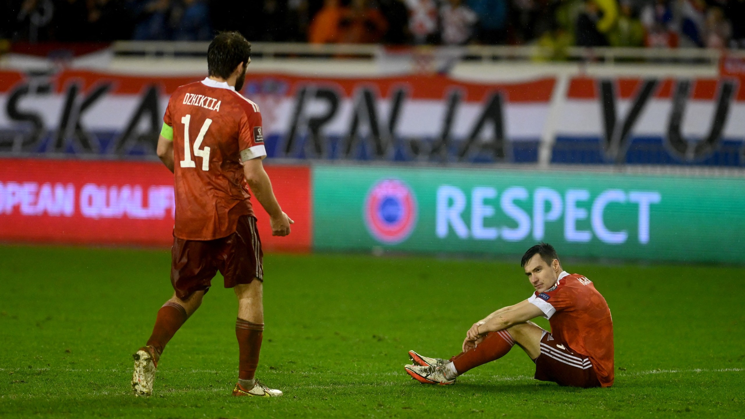 Russia's Georgi Dzhikiya (R) reacts at the end of the FIFA World Cup 2022 qualification football match between Croatia and Russia at the Poljud Stadium in Split on November 14, 2021. (DENIS LOVROVIC/AFP via Getty Images)