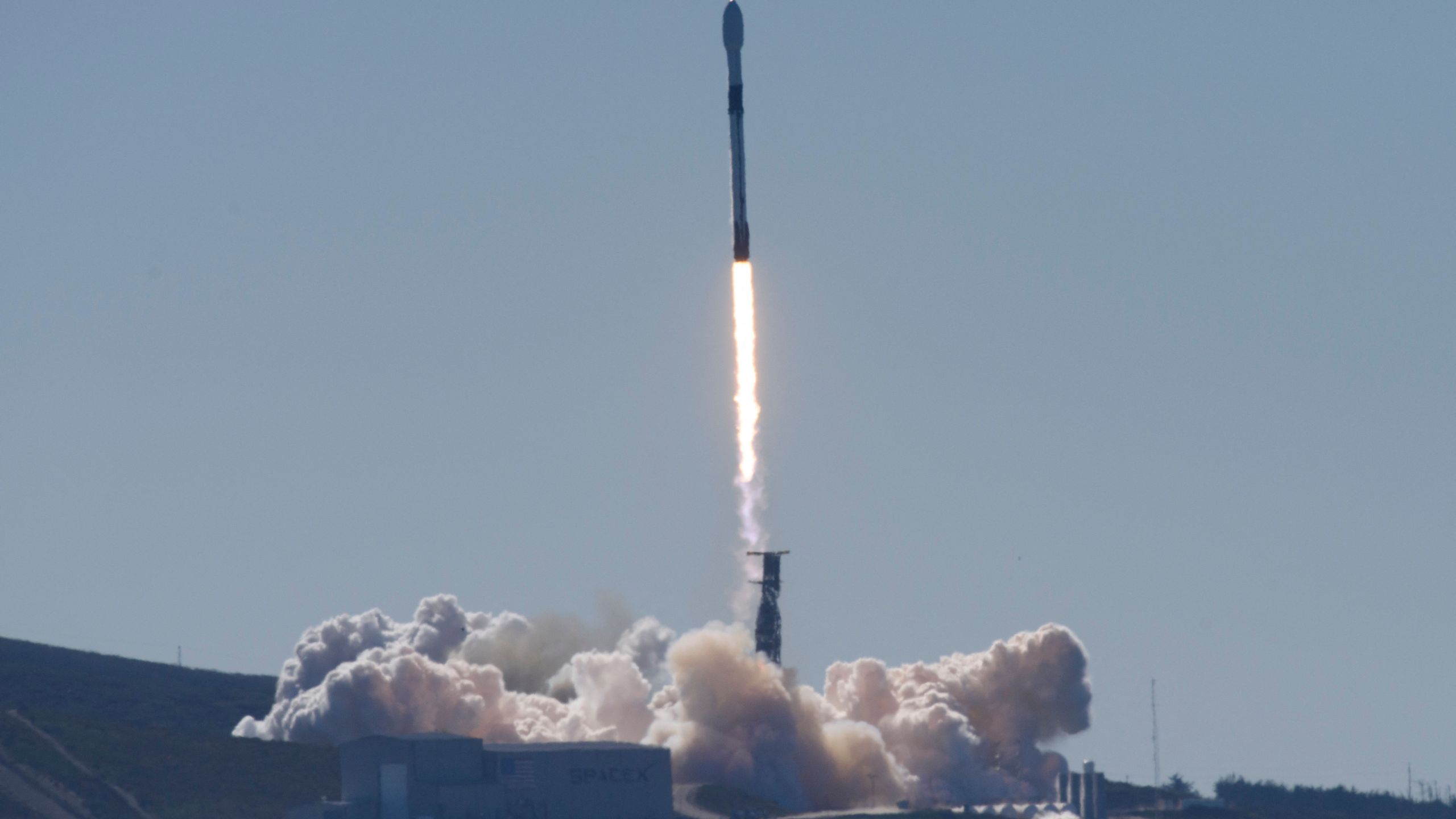 A SpaceX Falcon 9 rocket with the NROL-87 spy satellite payload for the National Reconnaissance Office launches from the SLC-4E launch pad at Vandenberg U.S. Space Force Base on Feb. 2, 2022 in Lompoc. (Patrick T. FALLON / AFP via Getty Images)