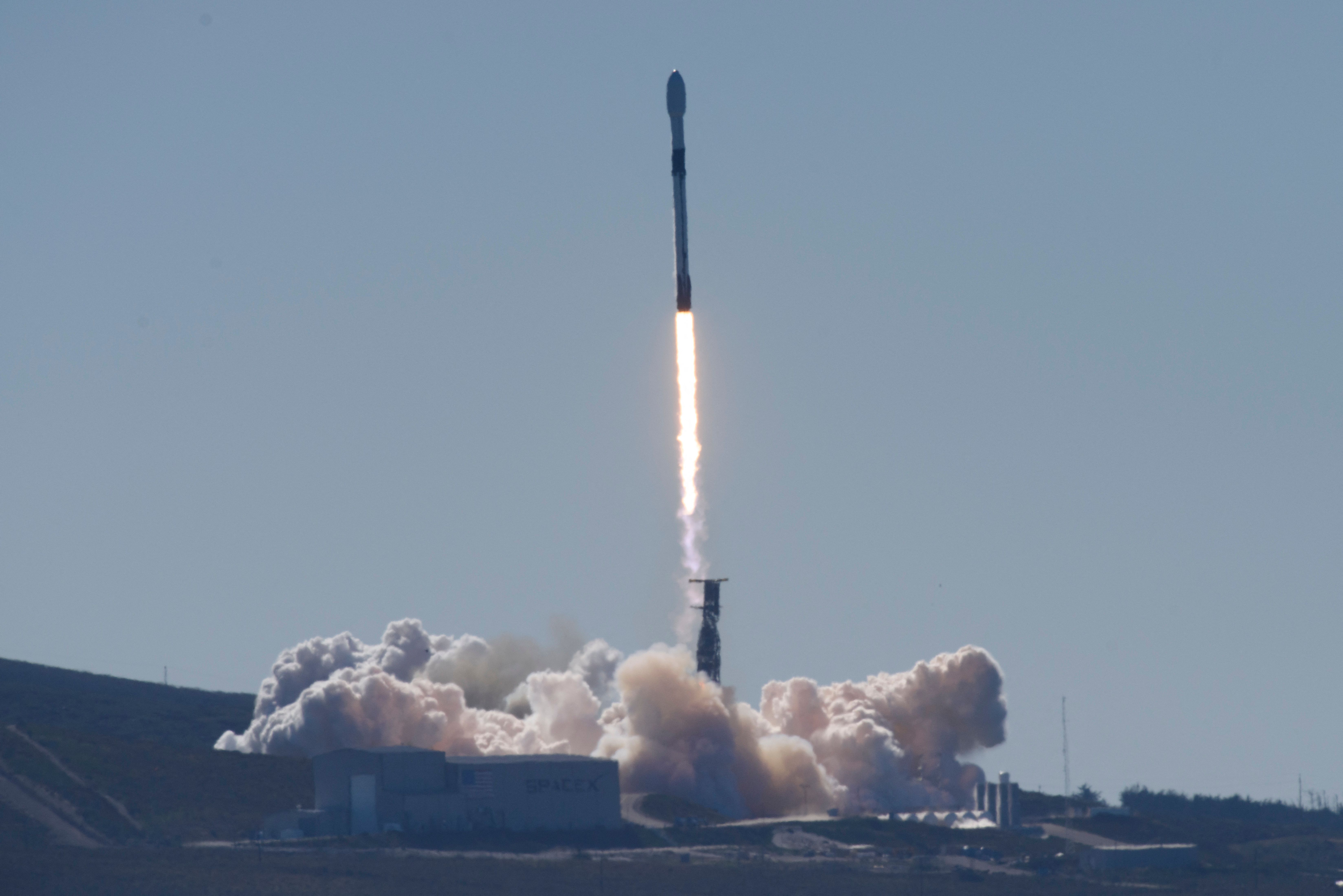 A SpaceX Falcon 9 rocket with the NROL-87 spy satellite payload for the National Reconnaissance Office launches from the SLC-4E launch pad at Vandenberg U.S. Space Force Base on Feb. 2, 2022 in Lompoc. (Patrick T. FALLON / AFP via Getty Images)