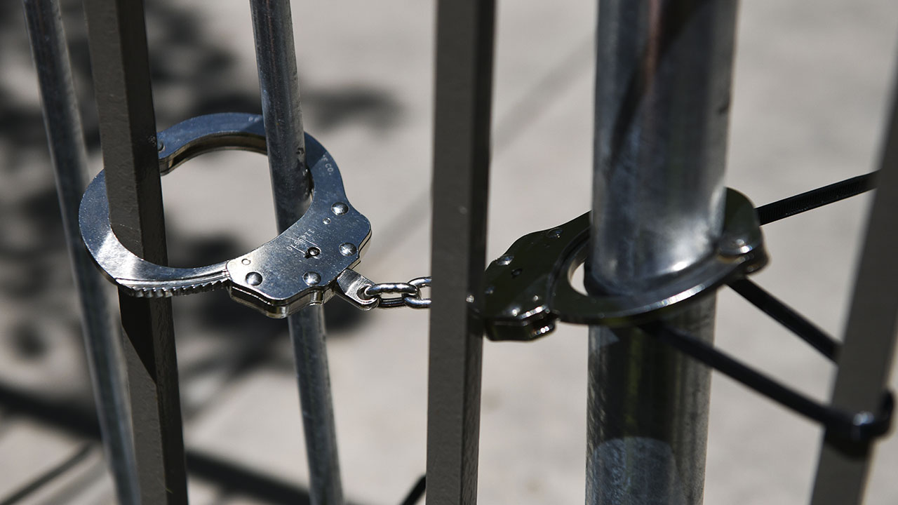 Handcuffs are seen in this undated file photo. (Michael Ciaglo/Getty Images)