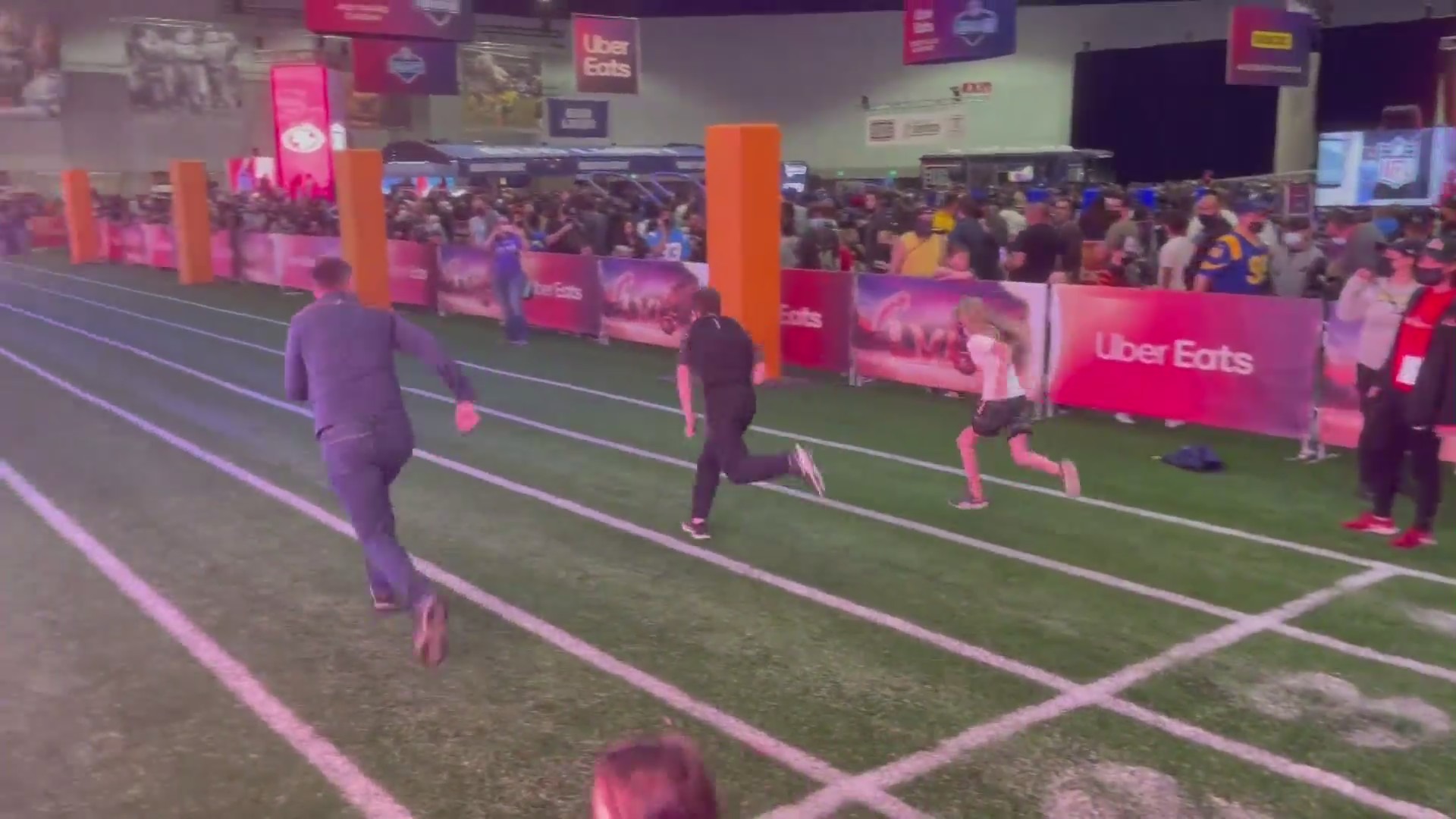 Football fans can put their athletic skills to the test at the Super Bowl Experience, as they did on Feb. 5, 2022. (KTLA)