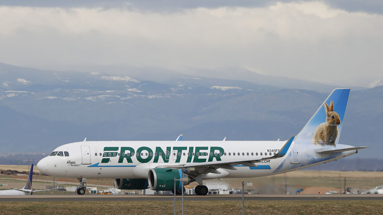 A Frontier Airlines jetliner taxis to a runway to take off from Denver International Airport Thursday, April 23, 2020, in Denver. (AP Photo/David Zalubowski, File)