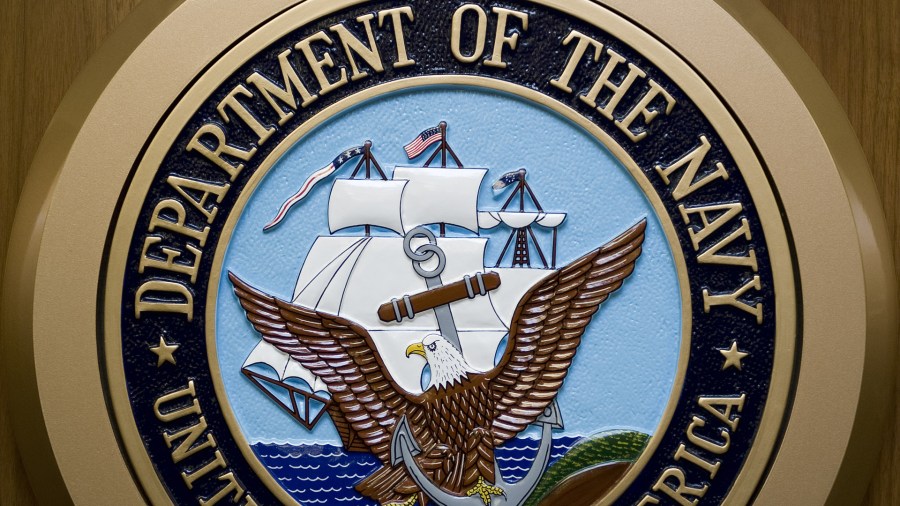 The US Department of the Navy seal hangs on the wall Feb. 24, 2009, at the Pentagon in Washington, D.C. (AFP Photo/Paul J. Richards (PAUL J. RICHARDS/AFP via Getty Images)