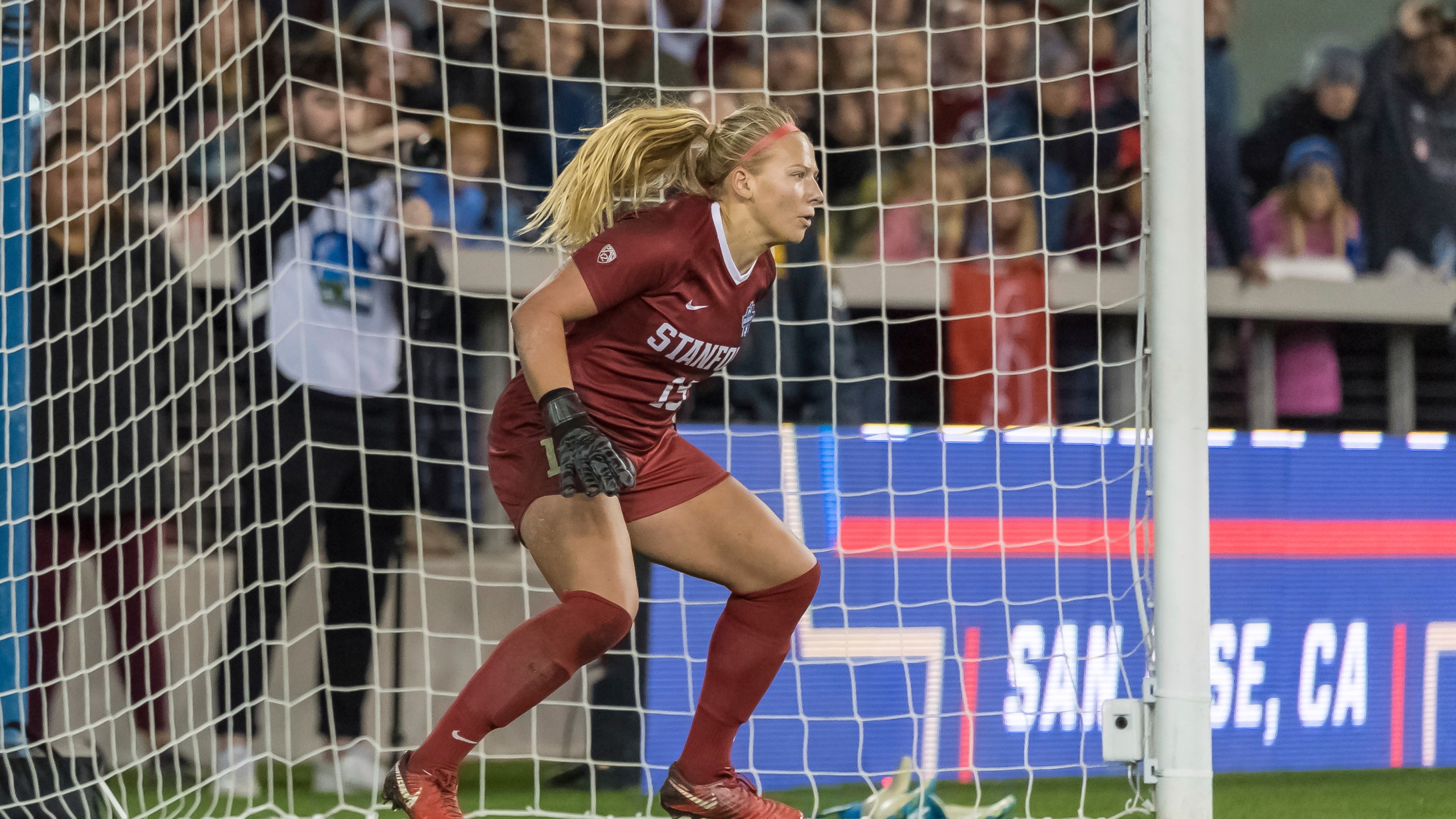 In a photo provided by Stanford Athletics, Stanford goalkeeper Katie Meyer guards the goal against North Carolina in the NCAA soccer tournament championship match on Dec. 8, 2019, in San Jose. (Jim Shorin/Stanford Athletics via AP)