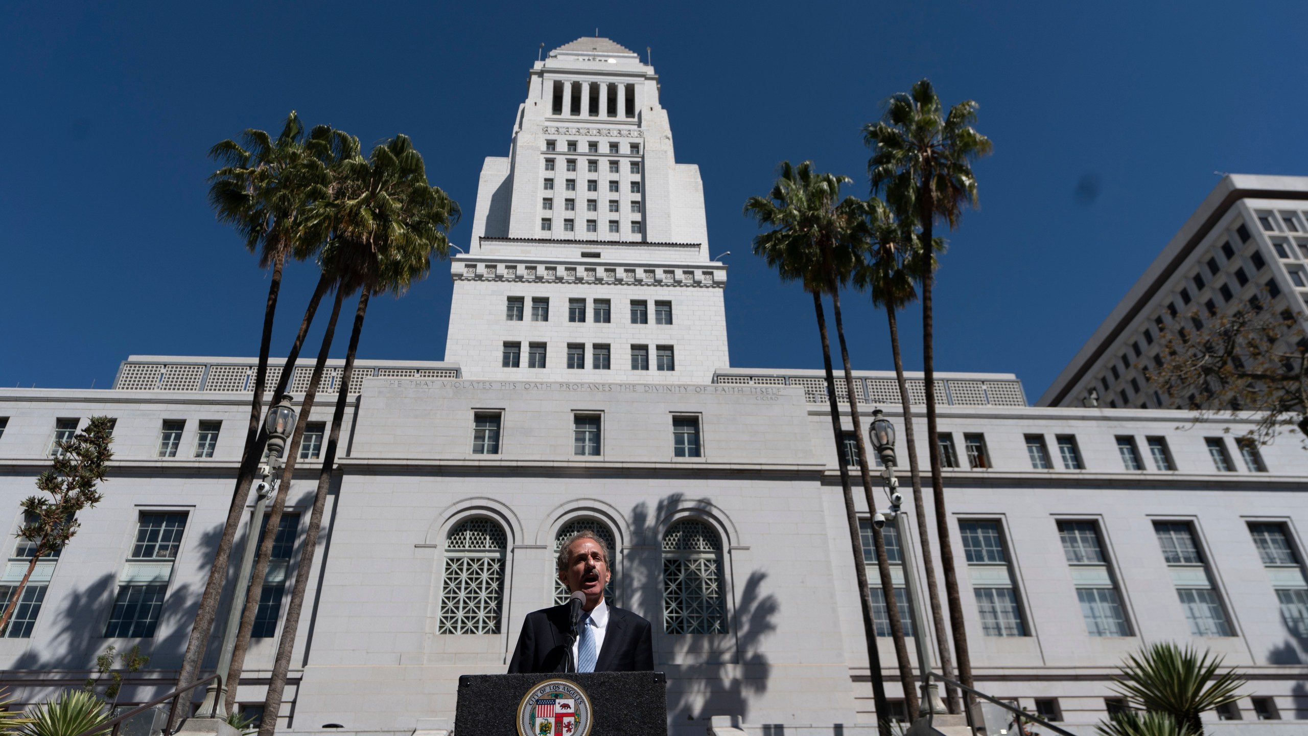 Los Angeles City Attorney Mike Feuer announces a lawsuit seeking environmental justice from Monsanto and two related companies for pollution of the City's waterways with polychlorinated biphenyls (PCBs) at a news conference outside Los Angeles City Hall, March 7, 2022. (AP Photo/Damian Dovarganes)