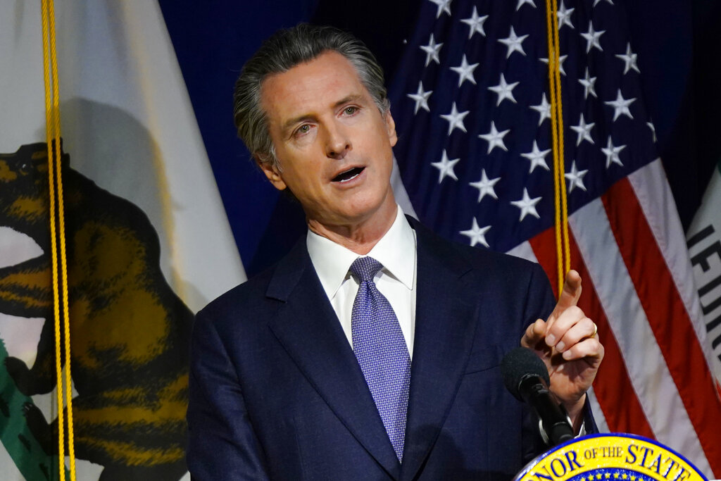 California Gov. Gavin Newsom unveils his proposed $286 billion 2022-2023 state budget during a news conference in Sacramento, Calif., Monday, Jan. 10, 2022. (AP Photo/Rich Pedroncelli)