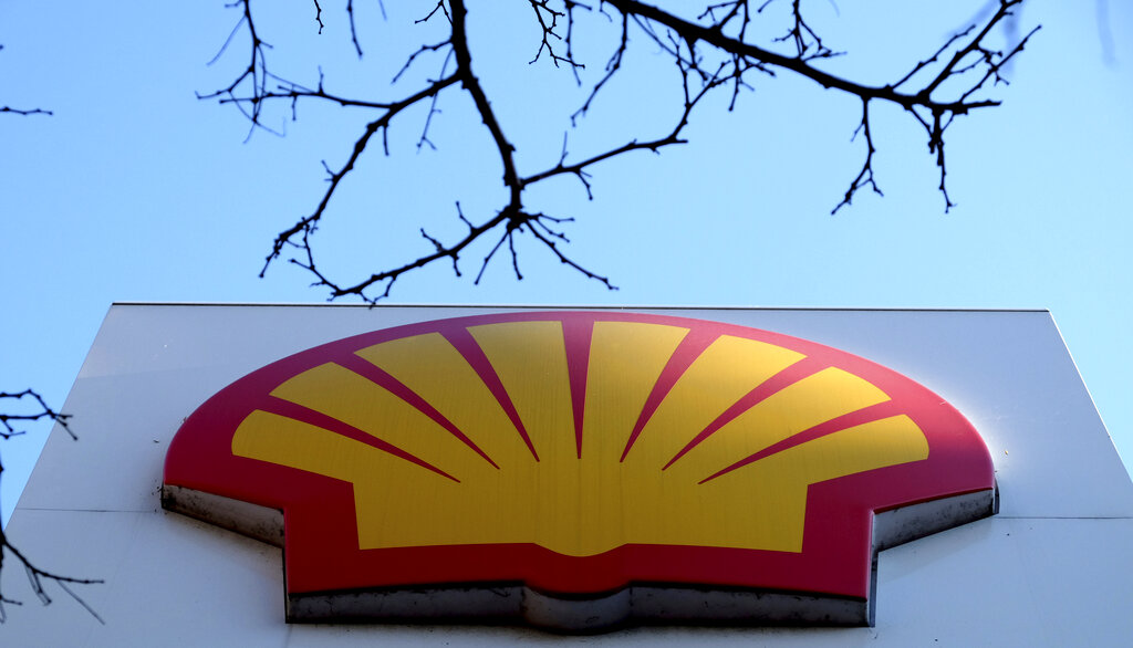 This Wednesday, Jan. 20, 2016 file photo shows the Shell logo at a petrol station in London. On Friday, Feb. 12, 2021. (AP Photo/Kirsty Wigglesworth, File)