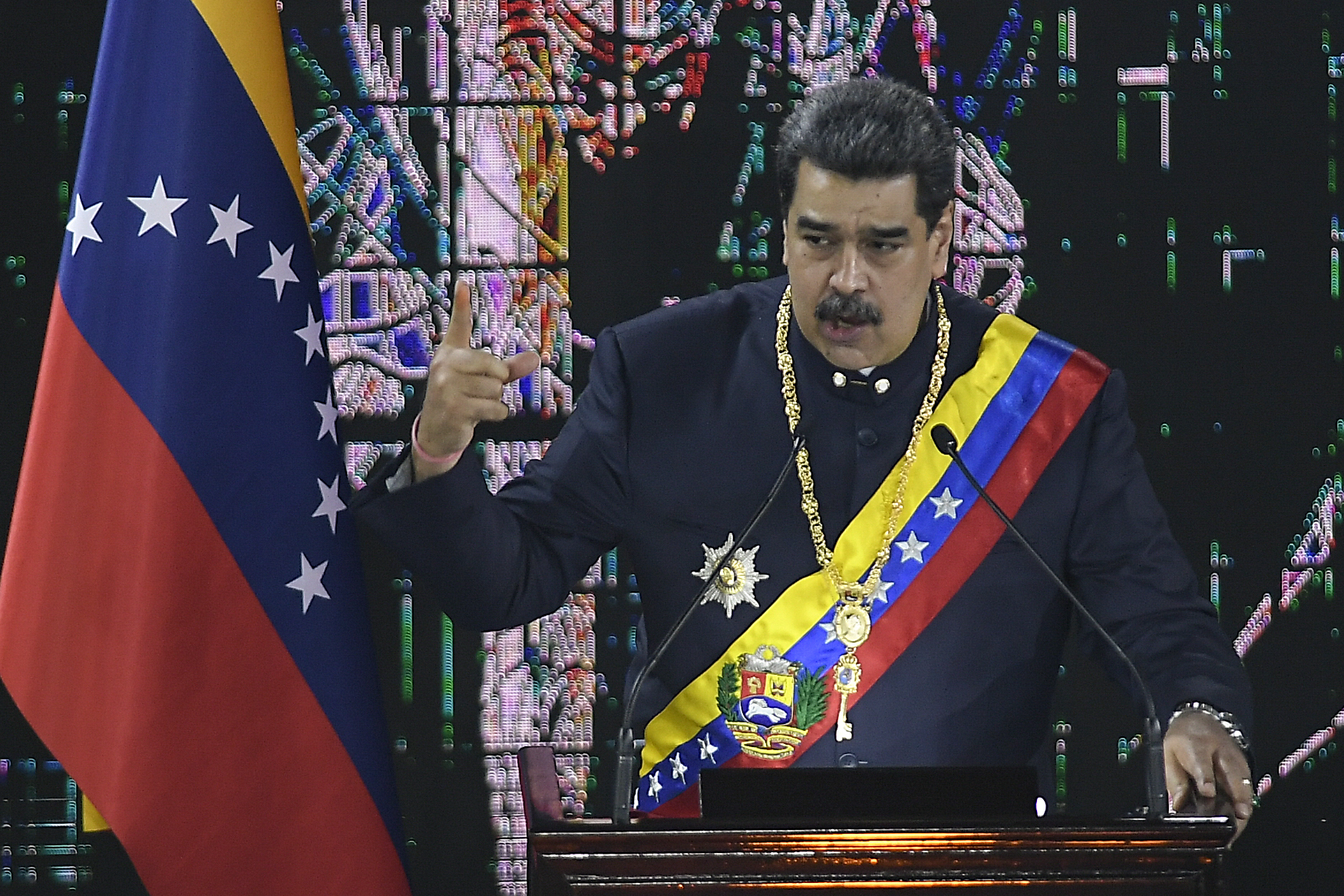 Venezuelan President Nicolas Maduro speaks during a ceremony marking the start of the judicial year at the Supreme Court in Caracas, Venezuela, Jan. 27, 2022. Maduro signaled an interest in improving relations with the U.S. following talks with high-level American officials prompted in part by Russia's invasion of Ukraine and concerns of rising gas prices in the U.S., in a televised meeting with cabinet members late Monday, March 7, 2022, but did not provide details of the discussions. (AP Photo/Matias Delacroix, File)