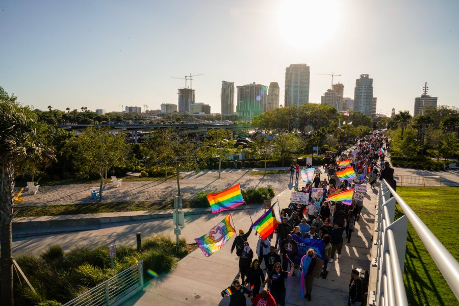 Marchers make their way toward the St. Pete Pier in St. Petersburg, Fla., on Saturday, March 12, 2022 during a march to protest the controversial "Don't say gay" bill passed by Florida's Republican-led legislature and now on its way to Gov. Ron DeSantis' desk. (Martha Asencio-Rhine/Tampa Bay Times via AP)