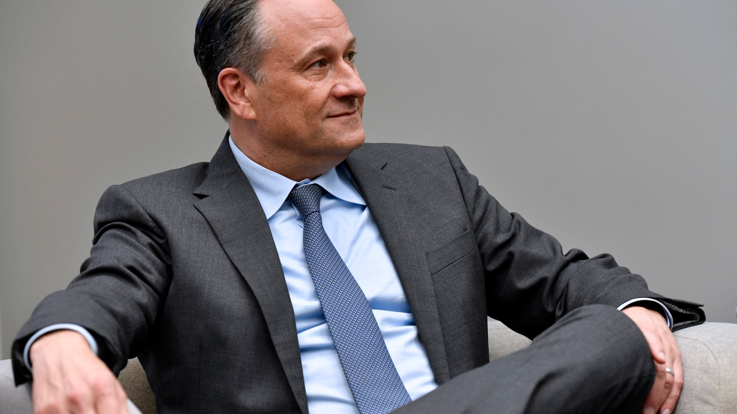 Second gentleman Doug Emhoff listens as he meet with women entrepreneurs for a panel discussion while visiting Mi Casa Resource Center in Denver, on March 11, 2022. (Jason Connolly/Pool via AP