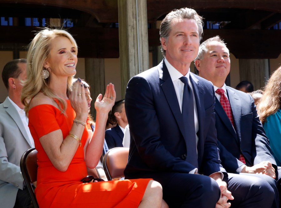 California first partner Jennifer Siebel Newsom, left, attends a signing ceremony with her husband, Gov. Gavin Newsom, next to her, at Sacramento City College in Sacramento, Calif., on July 1, 2019. (AP Photo/Rich Pedroncelli, File)