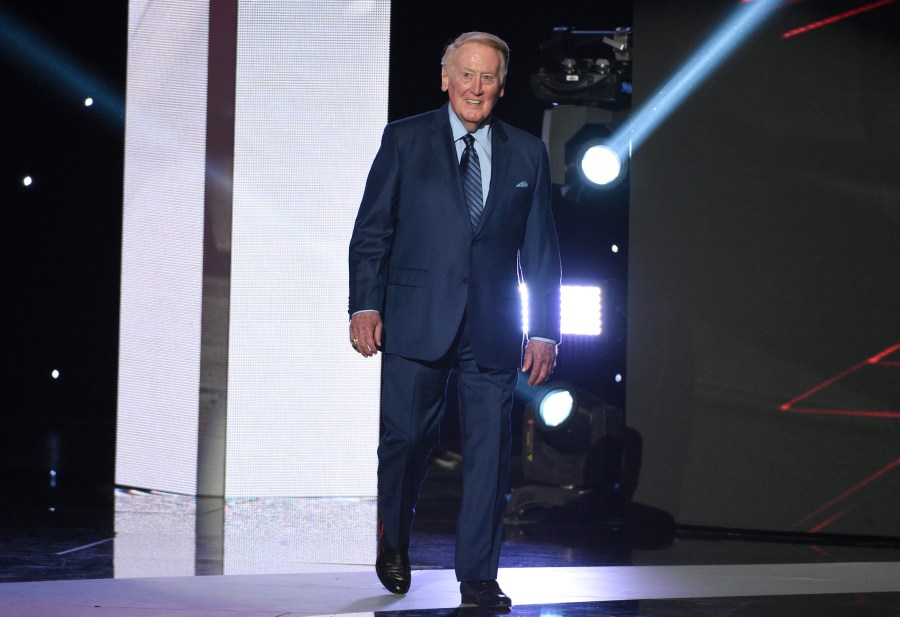 Vin Scully walks on stage to accept the Icon Award at the ESPYS at the Microsoft Theater on July 12, 2017, in Los Angeles. (Chris Pizzello/Invision/AP, File)