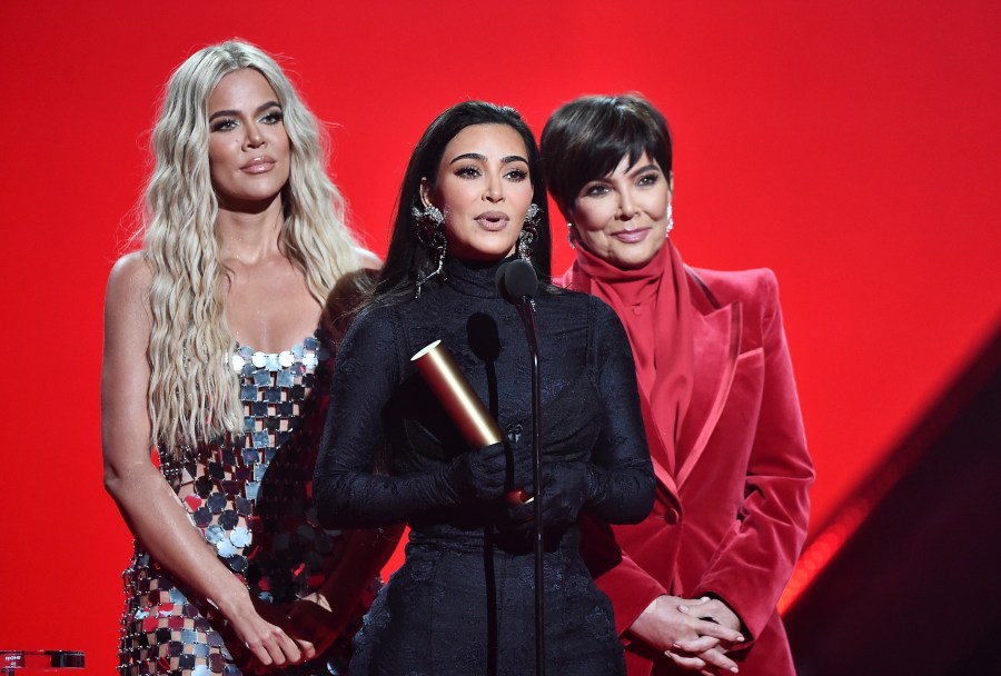 Khloé Kardashian, Kim Kardashian and Kris Jenner accept The Reality Show of 2021 award for ‘Keeping Up With the Kardashians' on stage during the 2021 People's Choice Awards held at Barker Hangar on Dec. 7, 2021 in Santa Monica. (Alberto Rodriguez/E! Entertainment/NBCUniversal/NBCU Photo Bank via Getty Images)