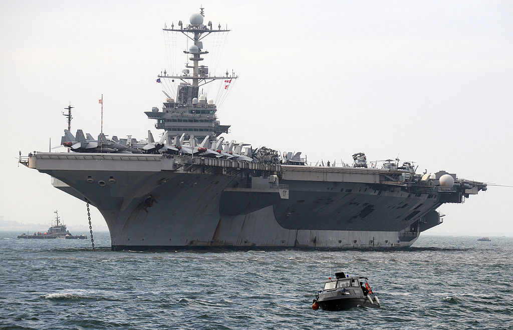 The nuclear-powered USS George Washington Nimitz-class aircraft carrier arrives in Manila on October 24, 2012. (NOEL CELIS/AFP via Getty Images)