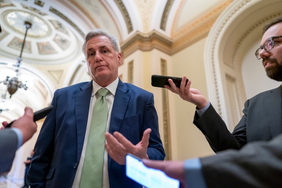 House Minority Leader Kevin McCarthy, R-Calif., talks to reporters at the Capitol in Washington, April 6, 2022. McCarthy is downplaying secretly recorded remarks he made about Donald Trump shortly after last year's attack on the Capitol. He also says he never told the then-president that he should resign — something that has not been reported. (AP Photo/J. Scott Applewhite, File)