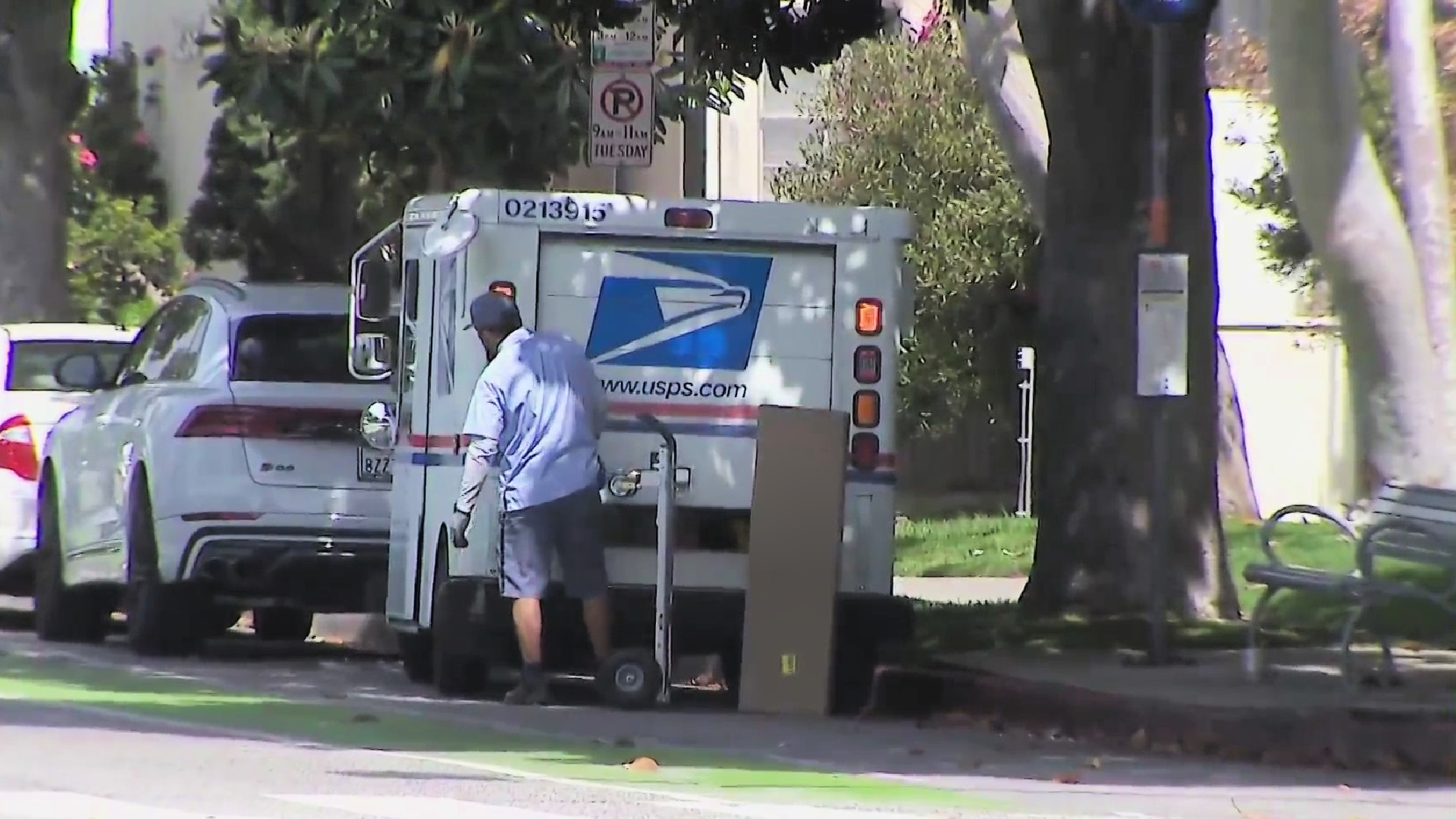 A mail carrier is seen in Santa Monica April 11, 2022. (KTLA)