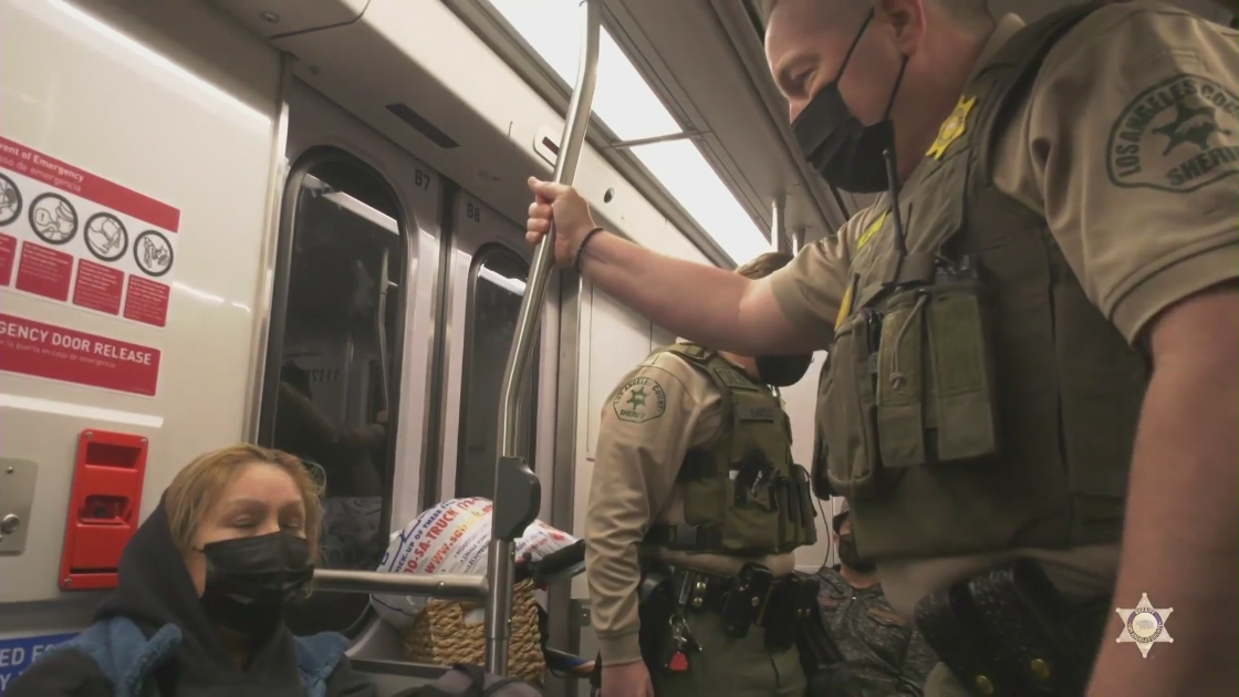 Alex Villanueva rides the L.A. subway in this undated photo provided by the Los Angeles County Sheriff’s Department.