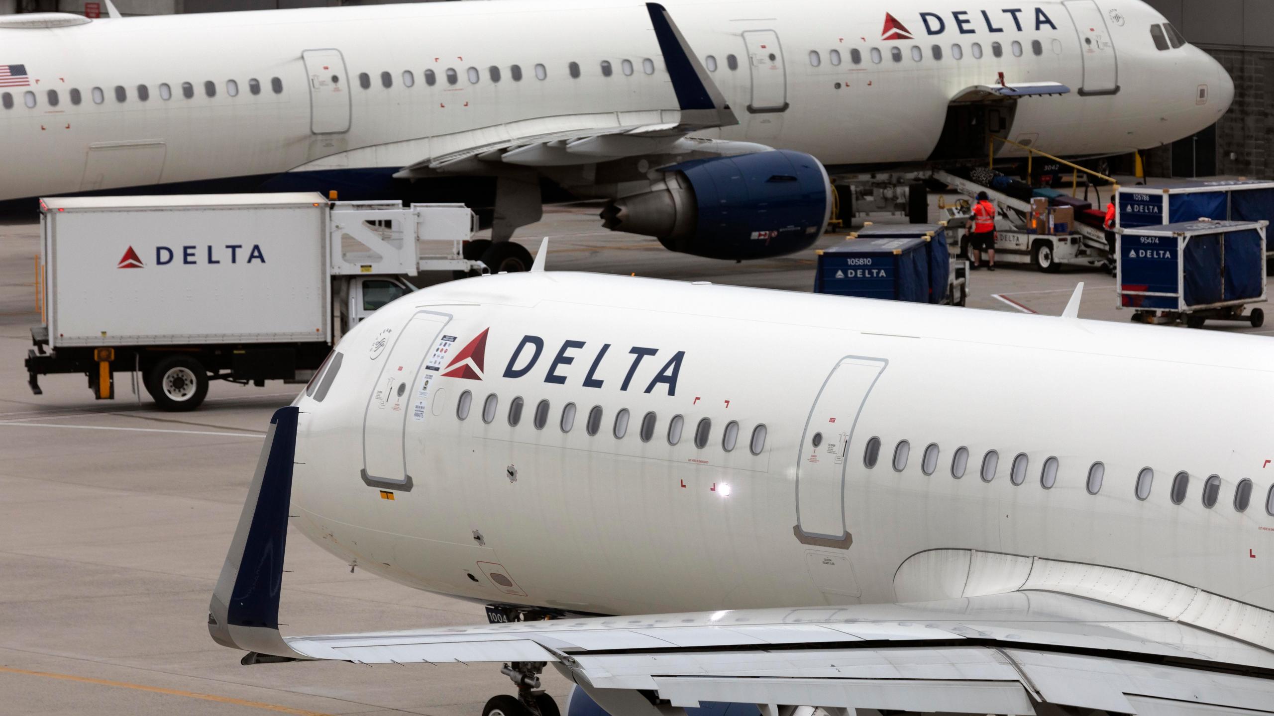 Delta Air Lines plane leaves the gate on July 12, 2021 at Logan International Airport in Boston. (Michael Dwyer/Associated Press)