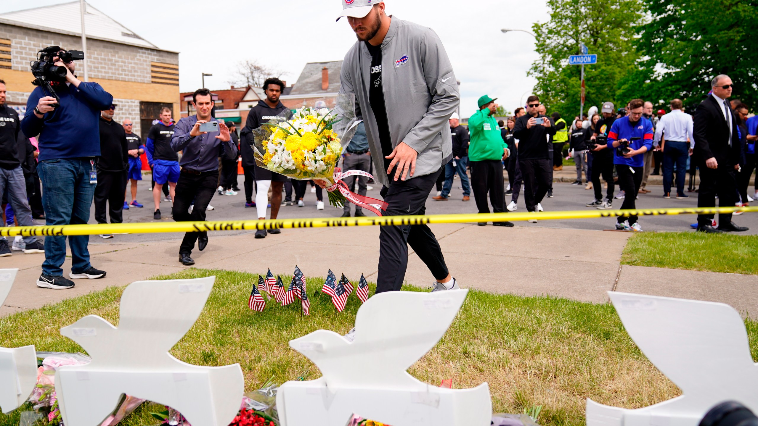 Buffalo Bills' Josh Allen visits the scene of Saturday's shooting at a supermarket, in Buffalo, N.Y., Wednesday, May 18, 2022. (AP Photo/Matt Rourke)