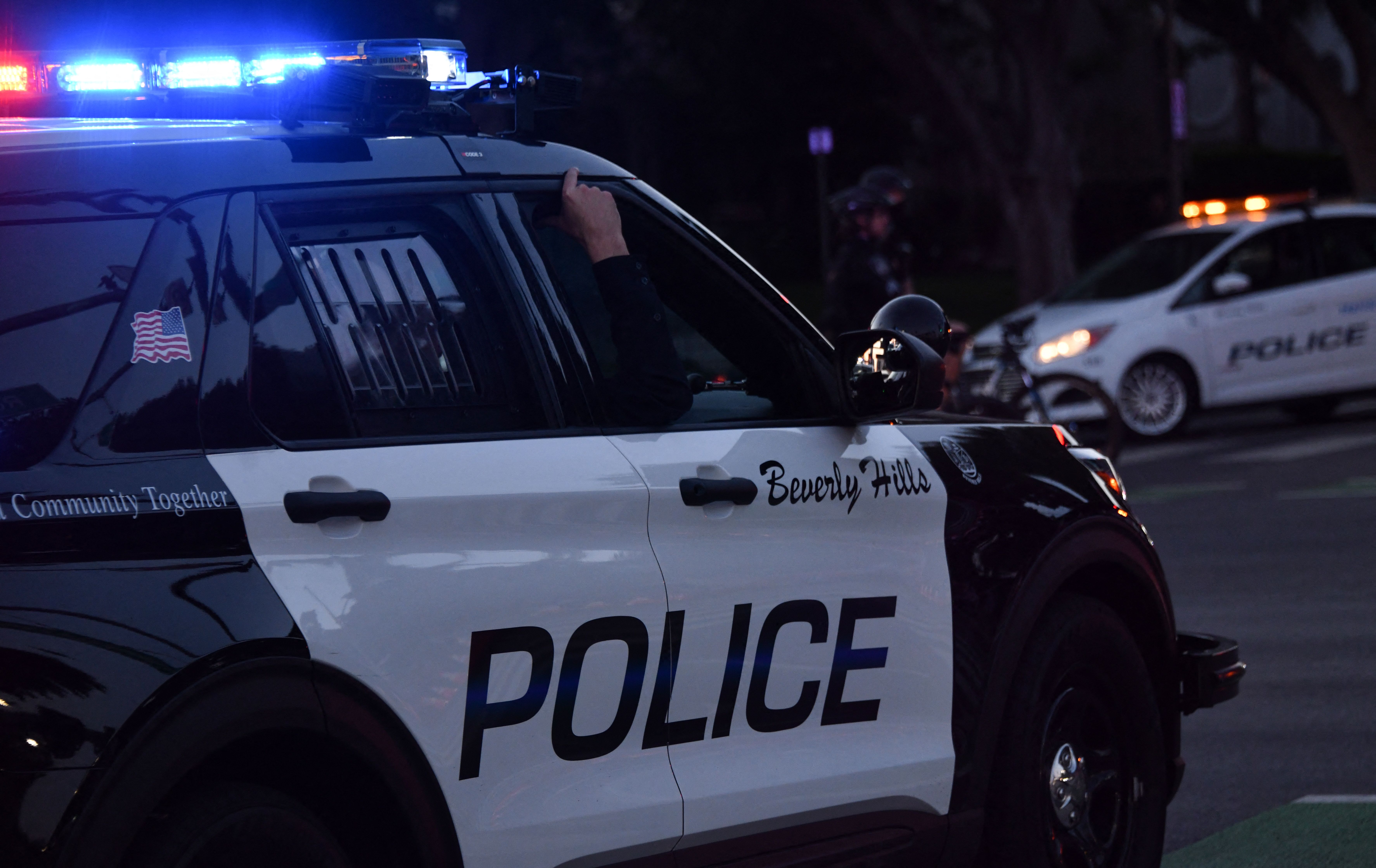 Beverly Hills police officers patrol in their car on November 1, 2020 in Beverly Hills. (file, Chris DELMAS / AFP)